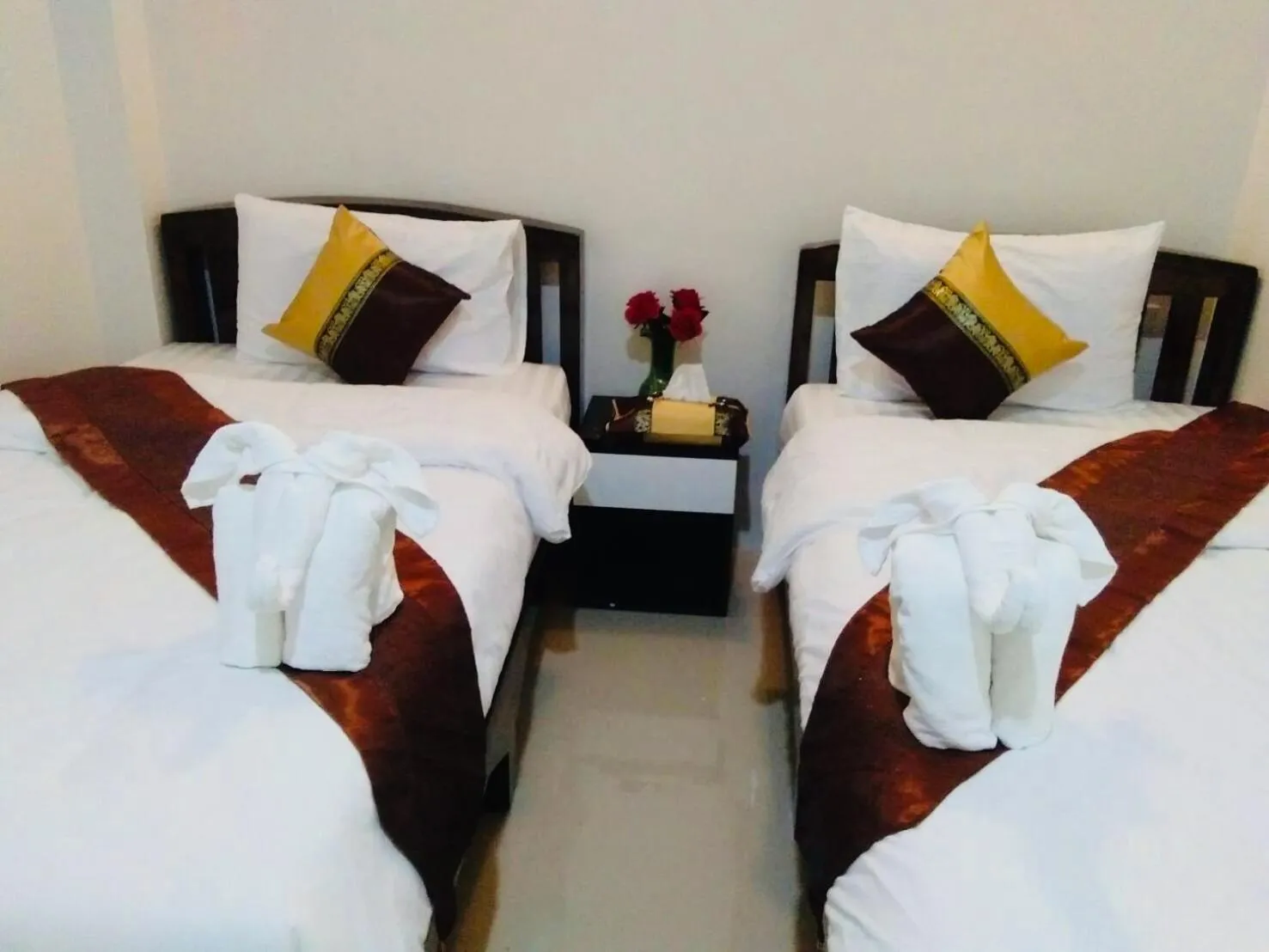 Bed in DE ROSE Hotel Chiang Mai