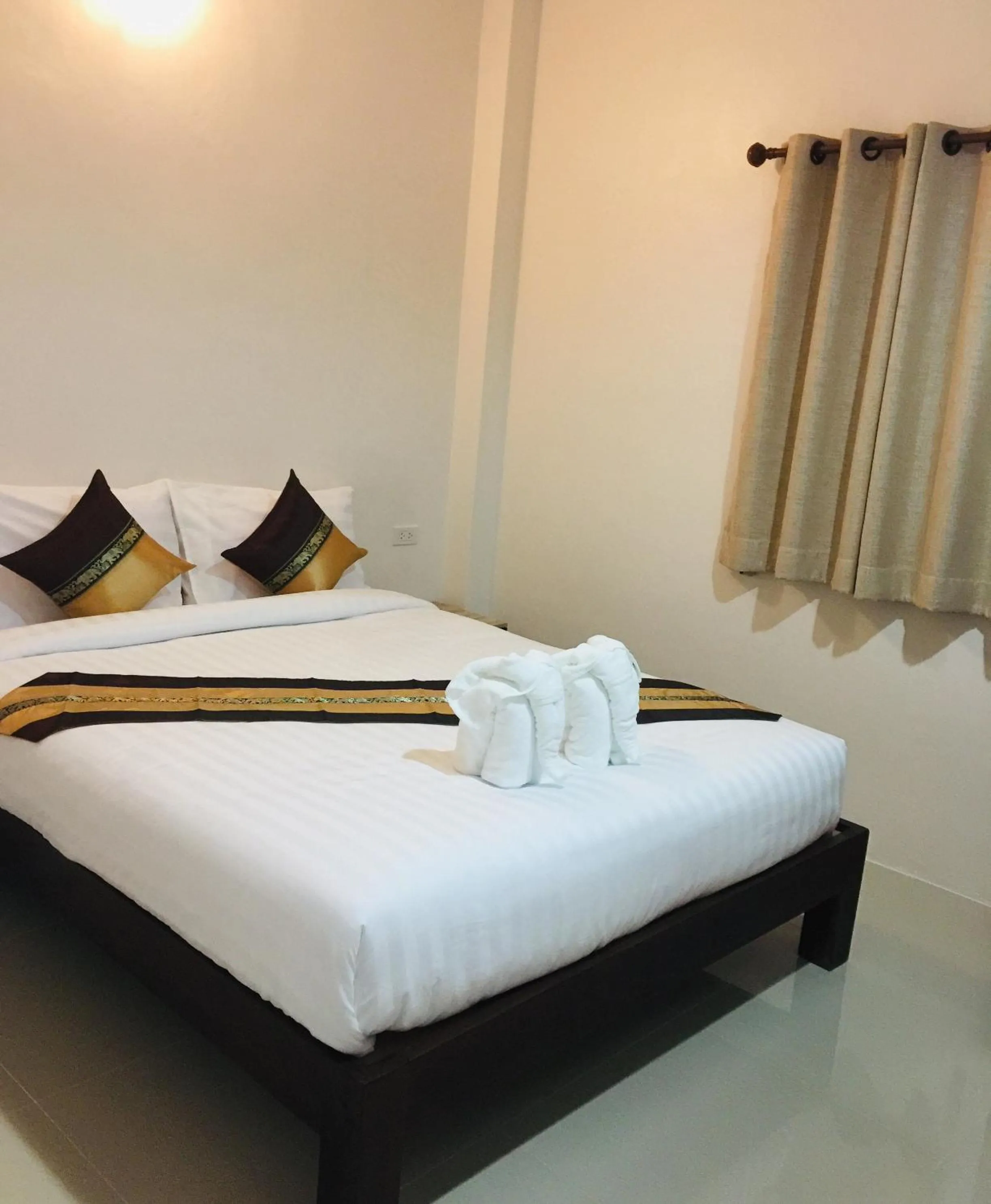 Bed in DE ROSE Hotel Chiang Mai