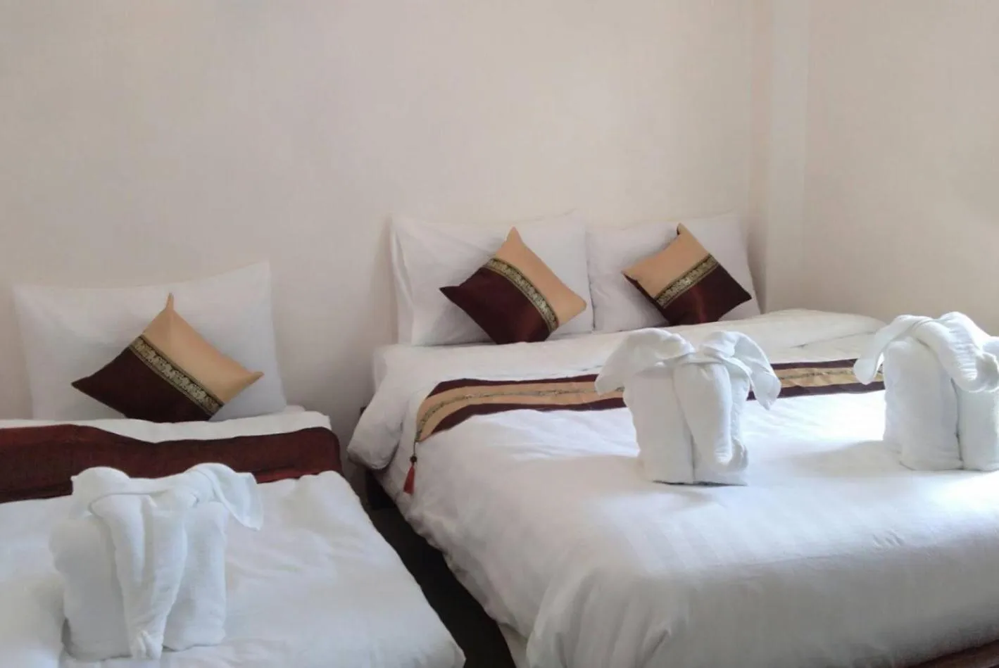 Bed in DE ROSE Hotel Chiang Mai