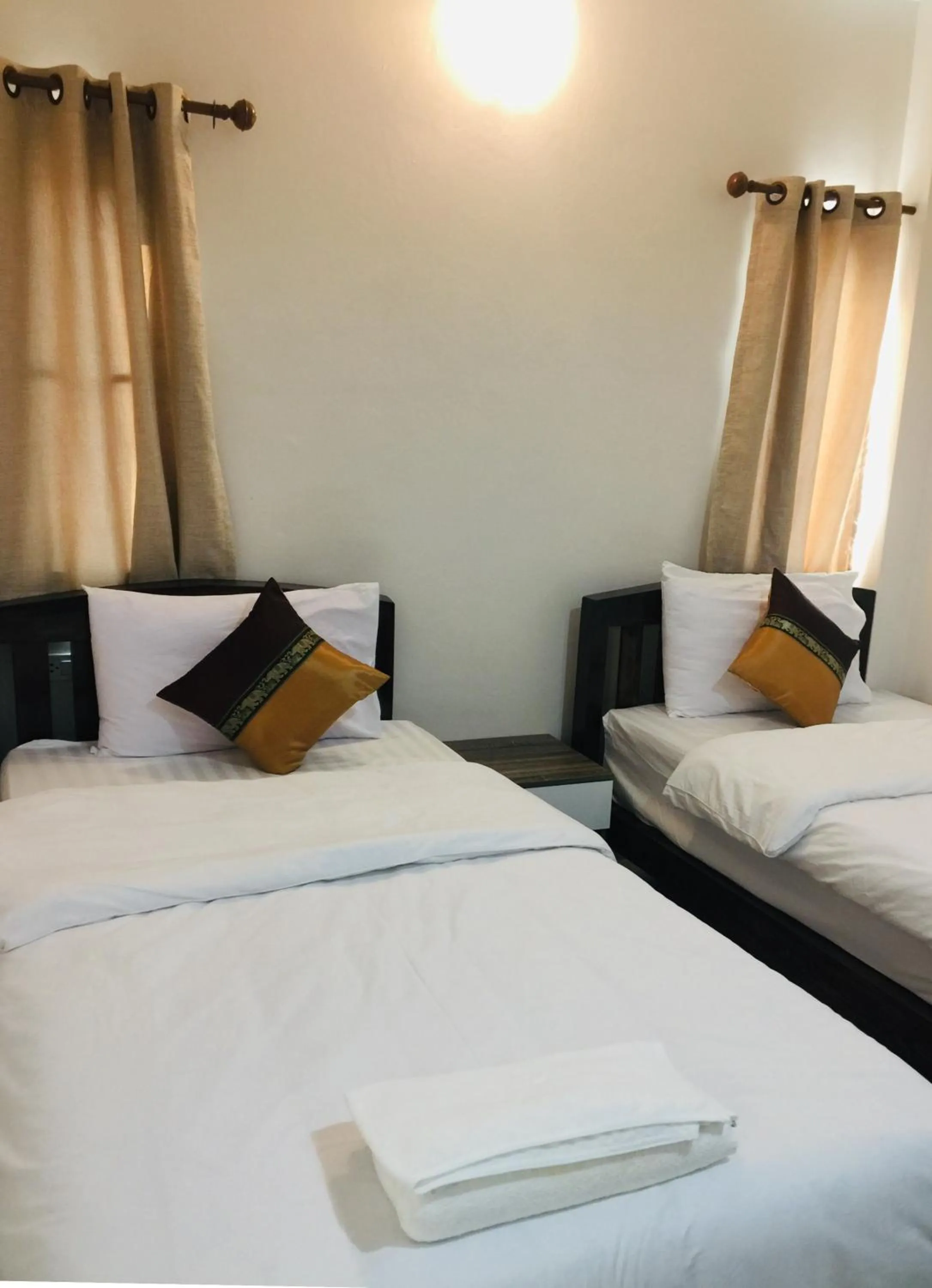 Bed in DE ROSE Hotel Chiang Mai