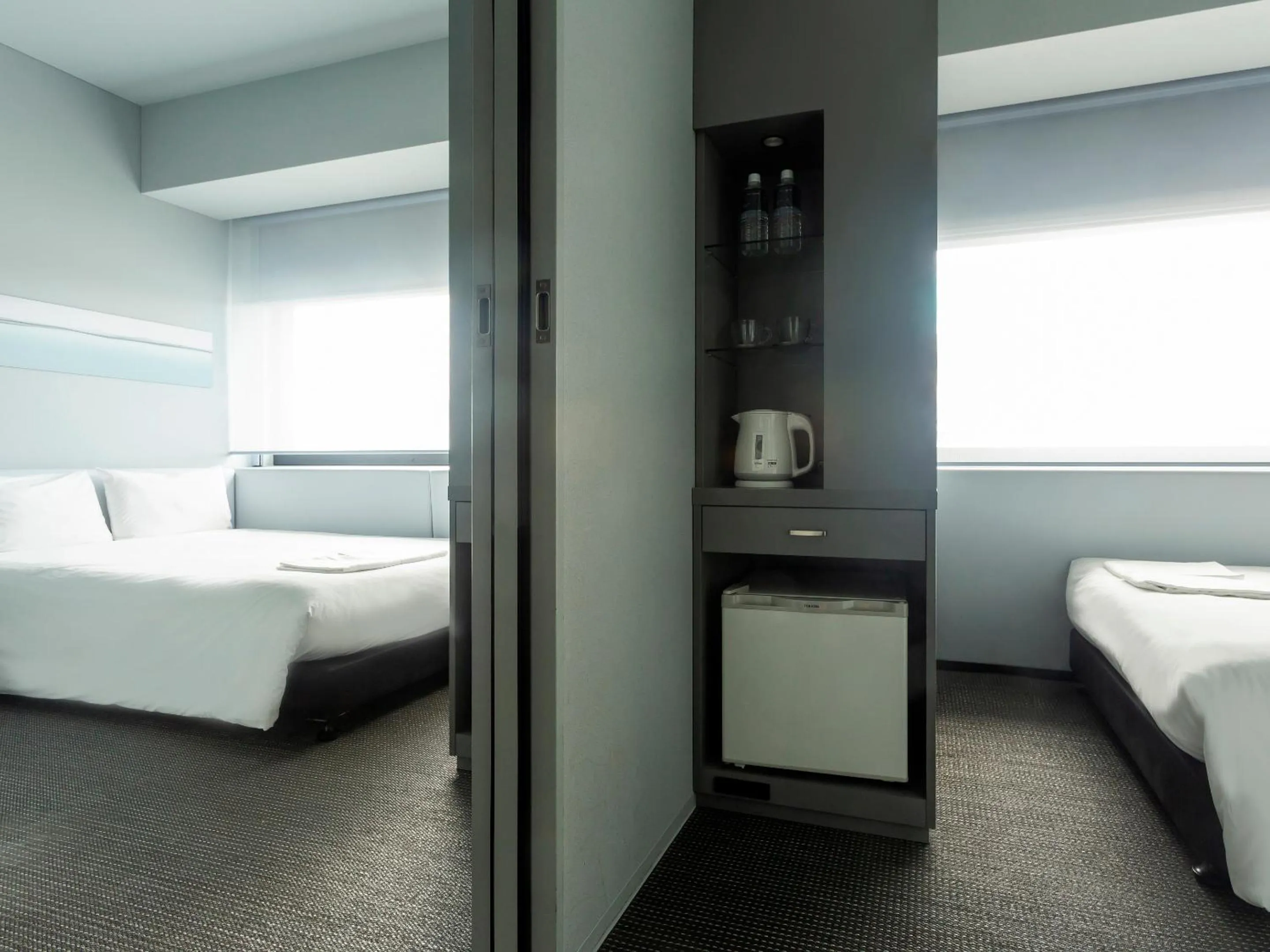 Bed in remm Shin-Osaka