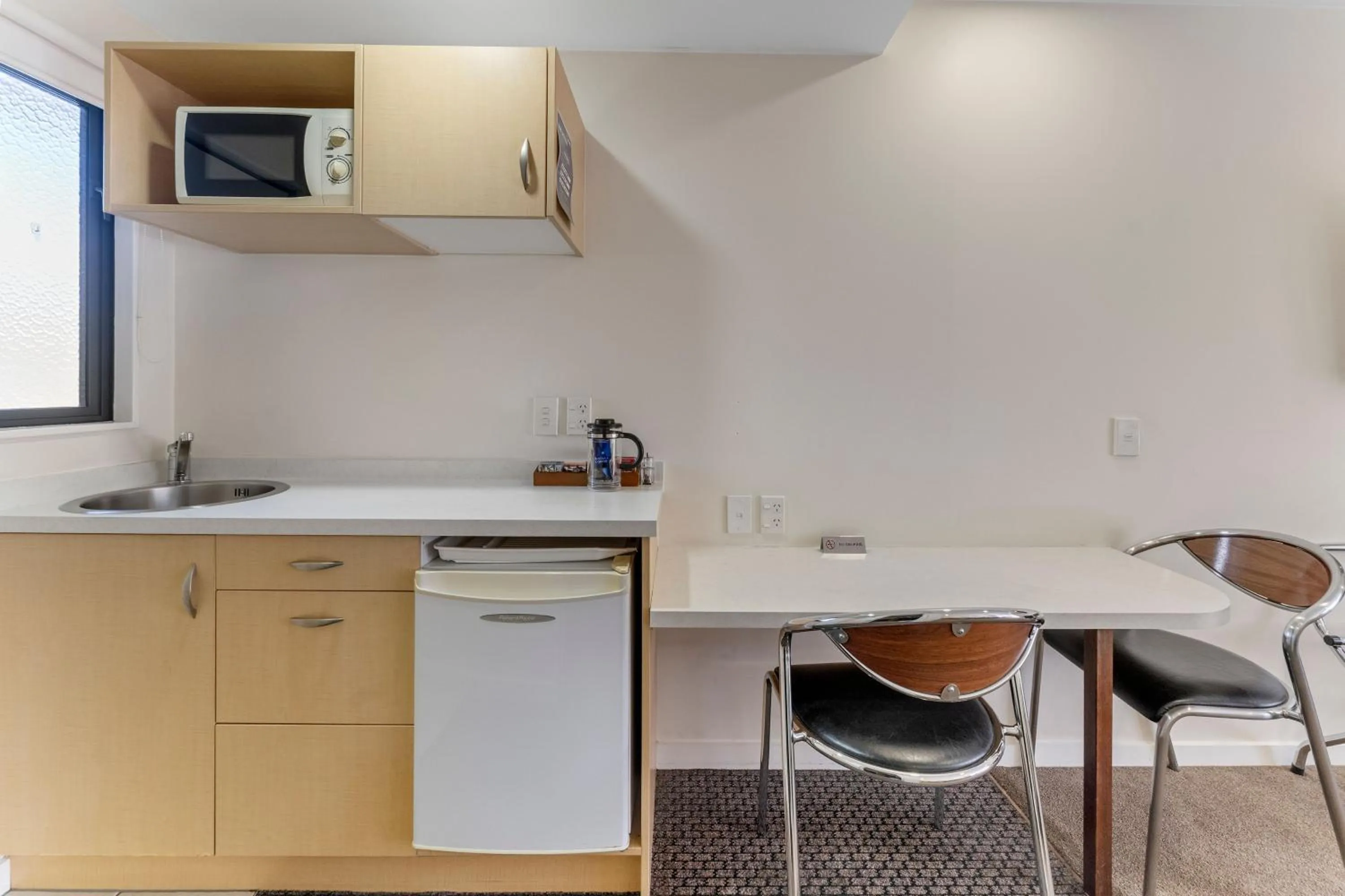 Kitchen or kitchenette in Nautilus Lodge Motel
