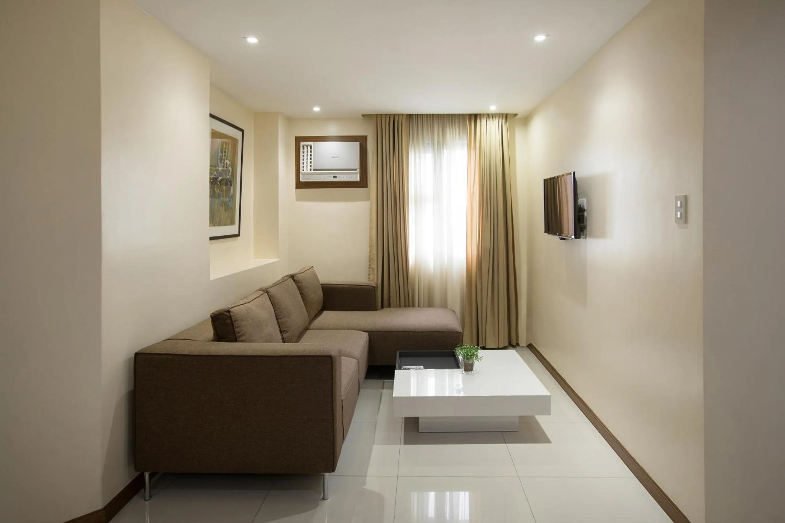 Living room in Golden Prince Hotel & Suites