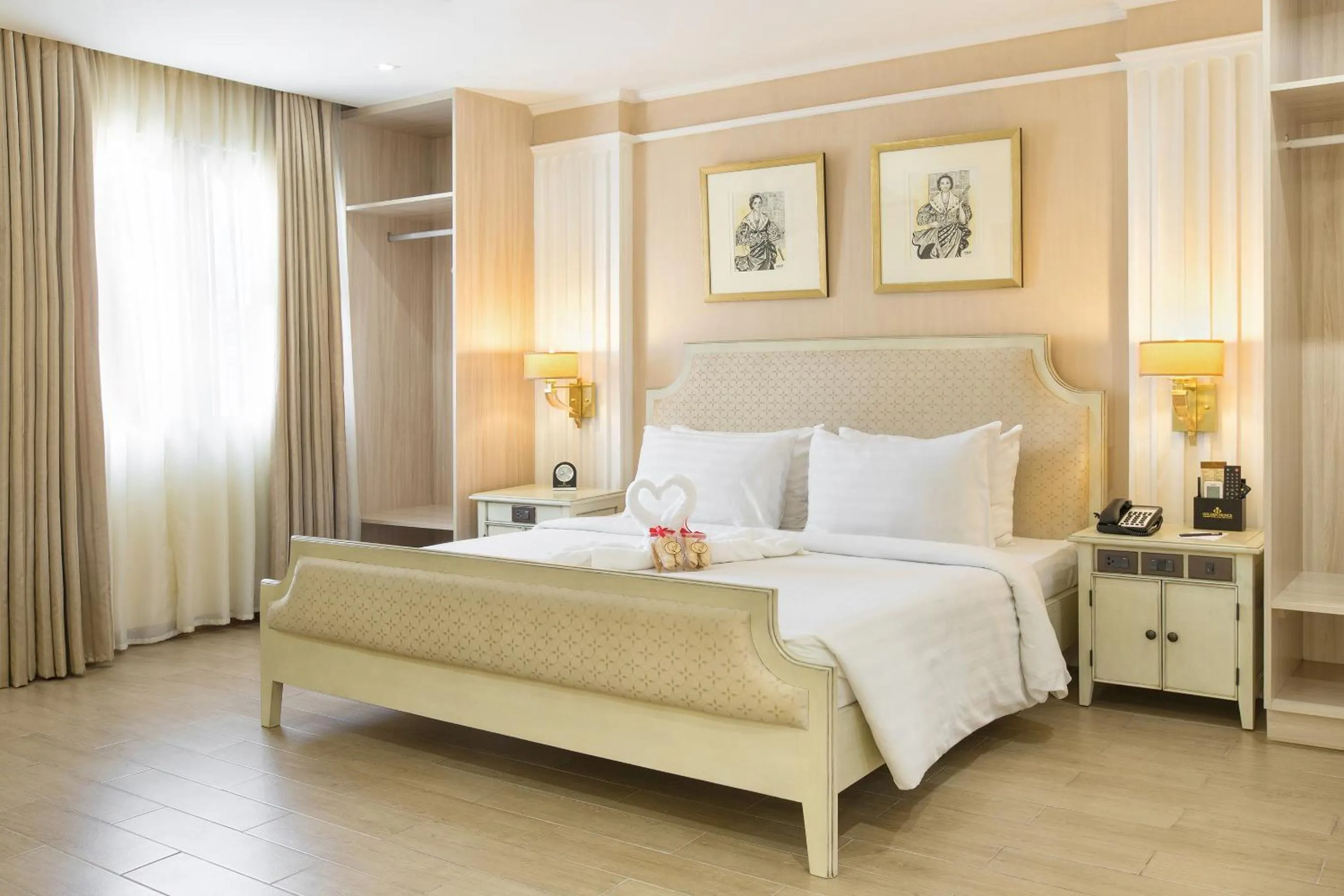 Bed in Golden Prince Hotel & Suites
