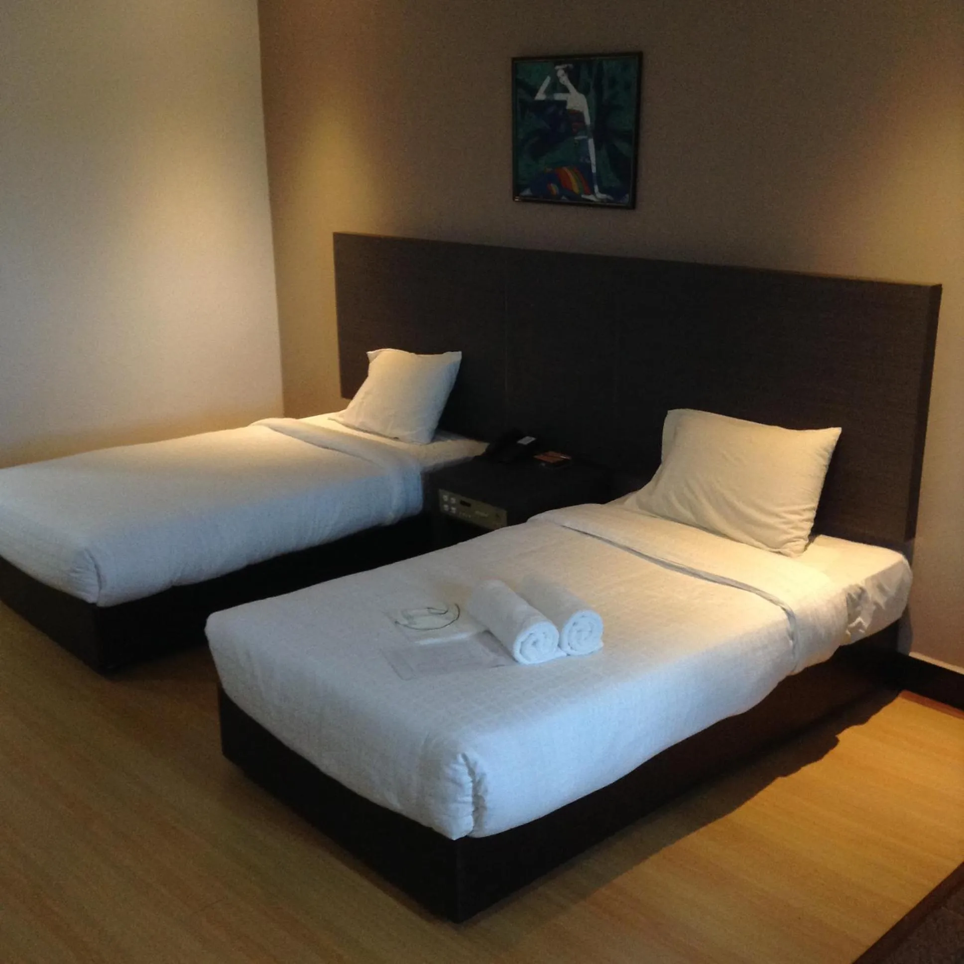 Bed in Purnama Hotel