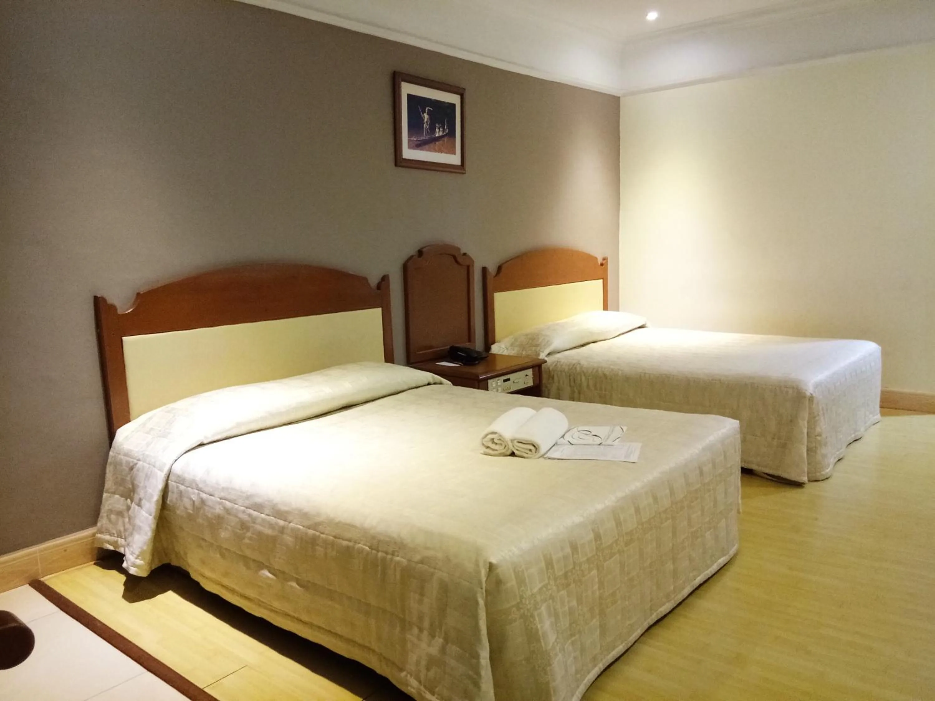 Bed in Purnama Hotel