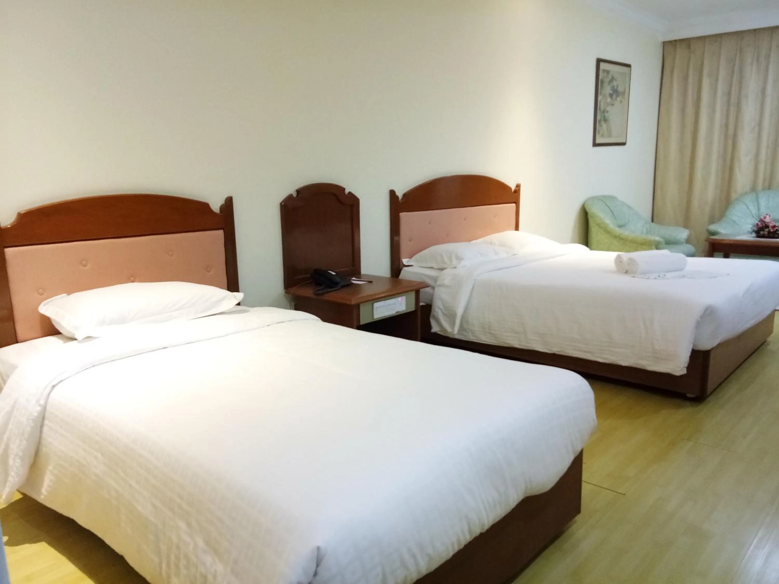 Bed in Purnama Hotel