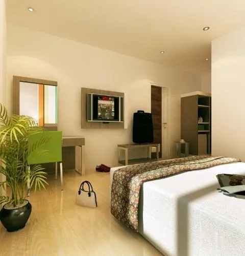 Bed in Pose In Hotel Solo