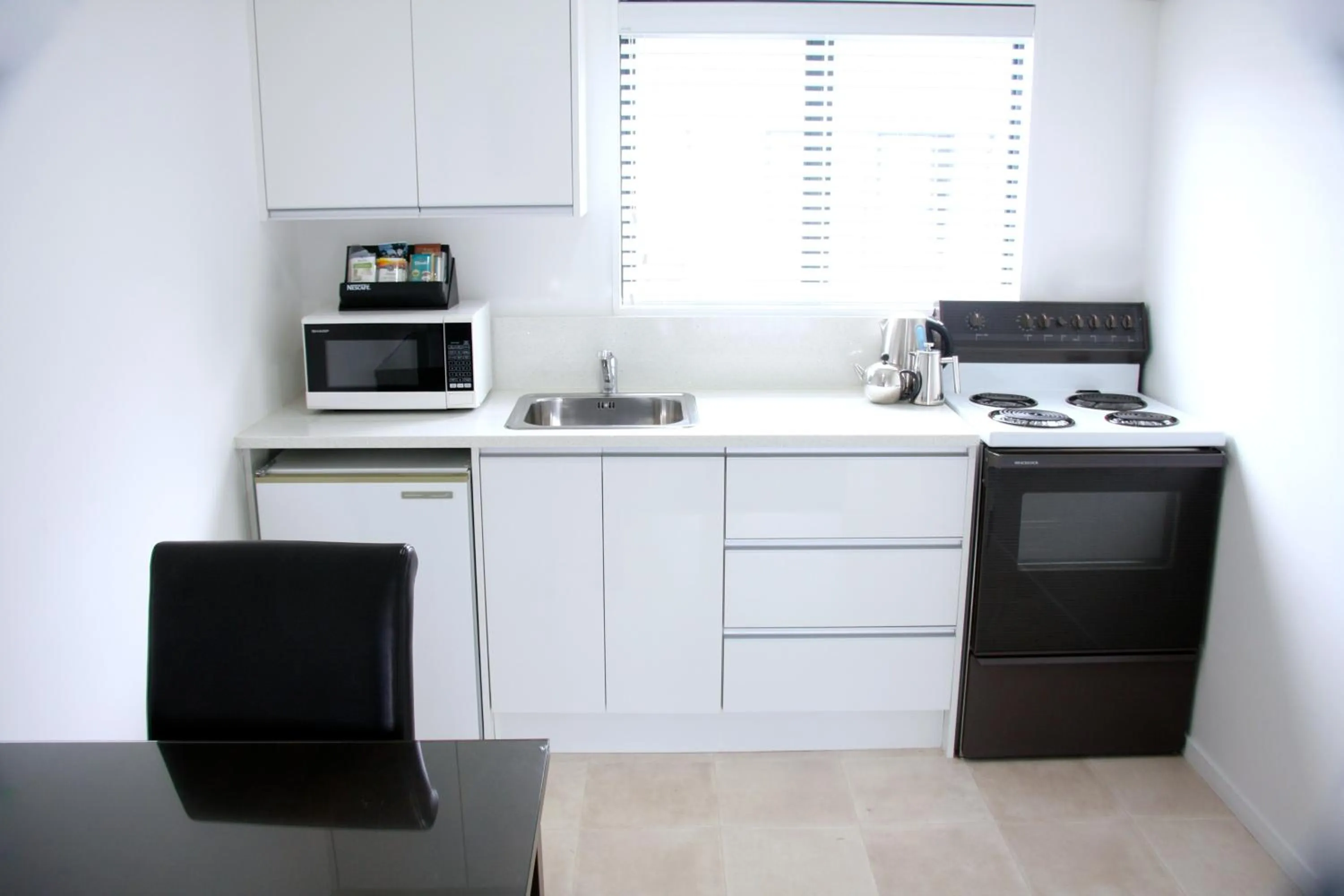 Kitchen or kitchenette in Camelot On Ulster