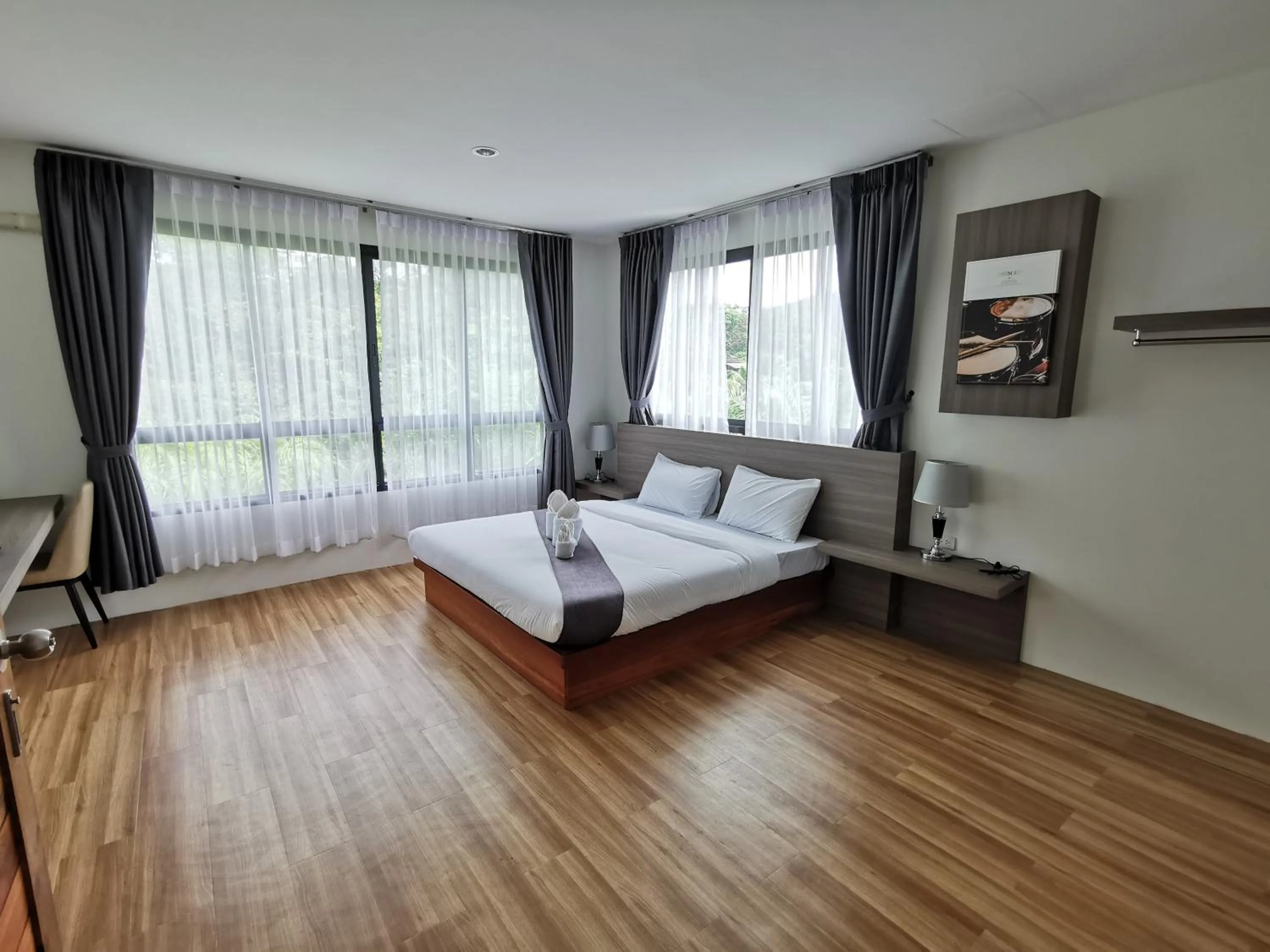 Seating area, Bed in Nana Beach Hotel & Resort