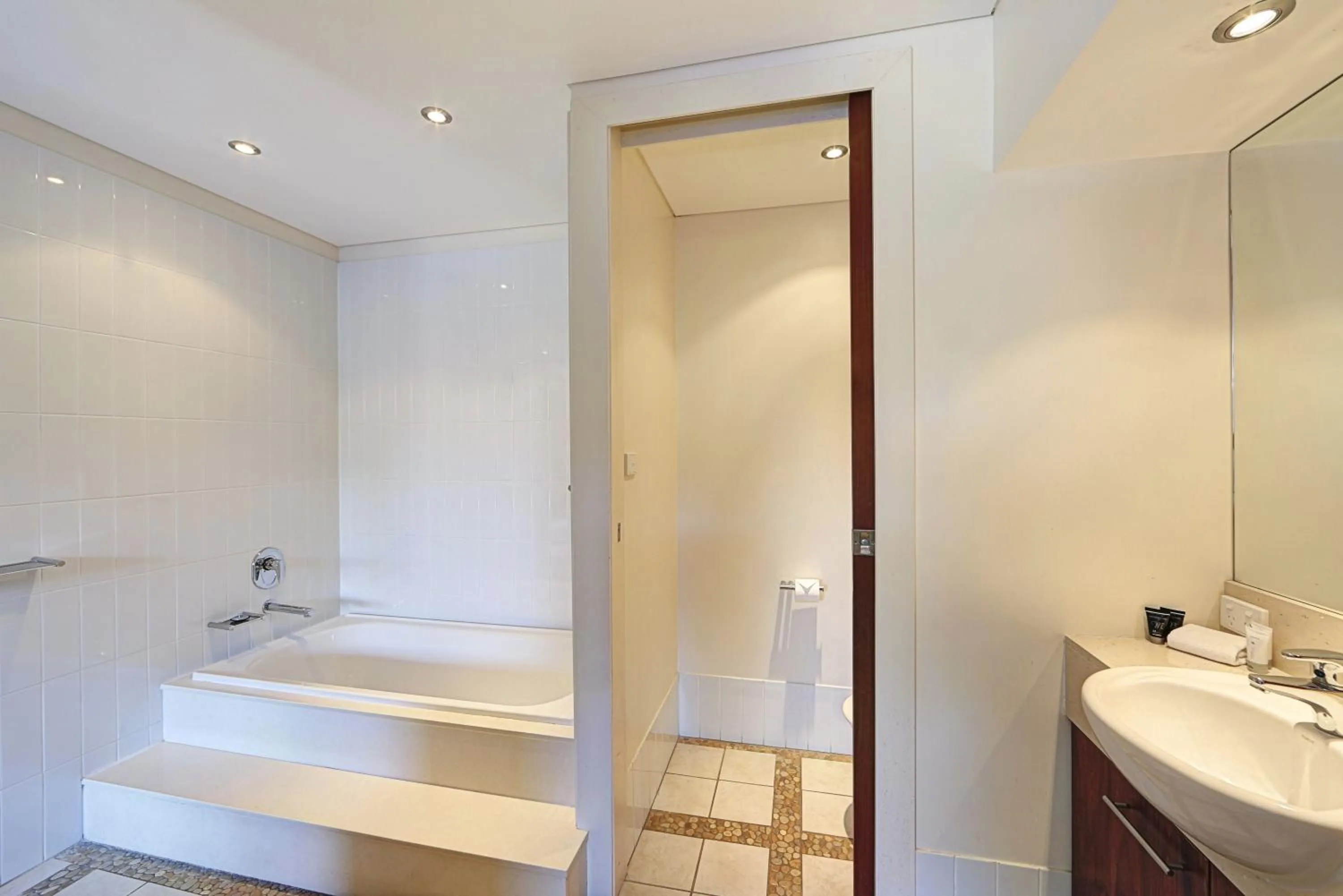 Bathroom in Sandcastles 1770 Motel & Resort