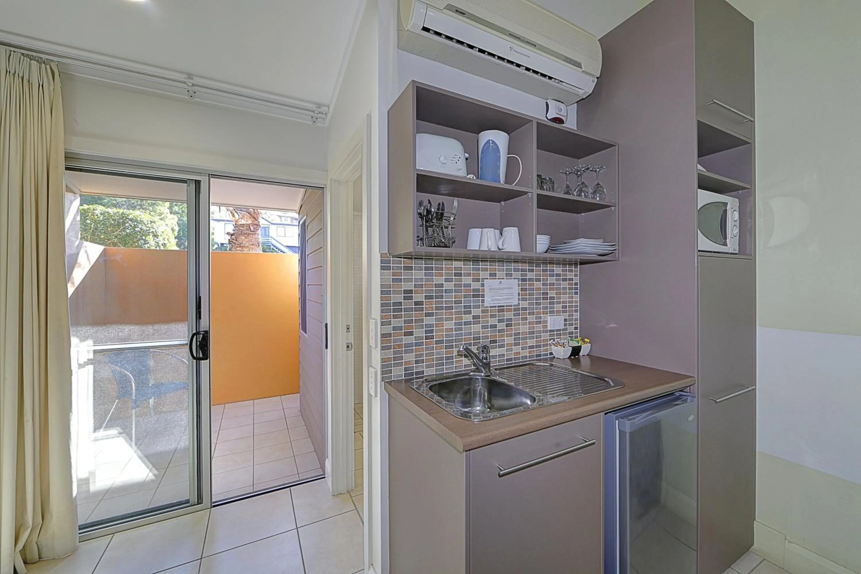 Kitchen or kitchenette in Sandcastles 1770 Motel & Resort