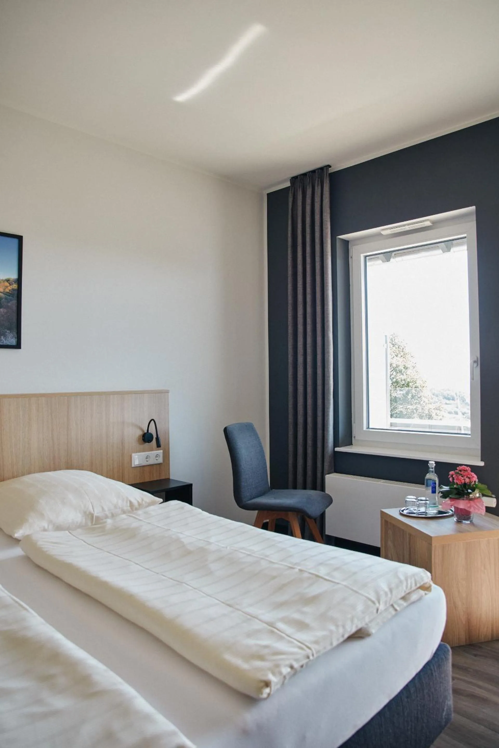 Living room, Bed in FETZ DAS LORELEY HOTEL