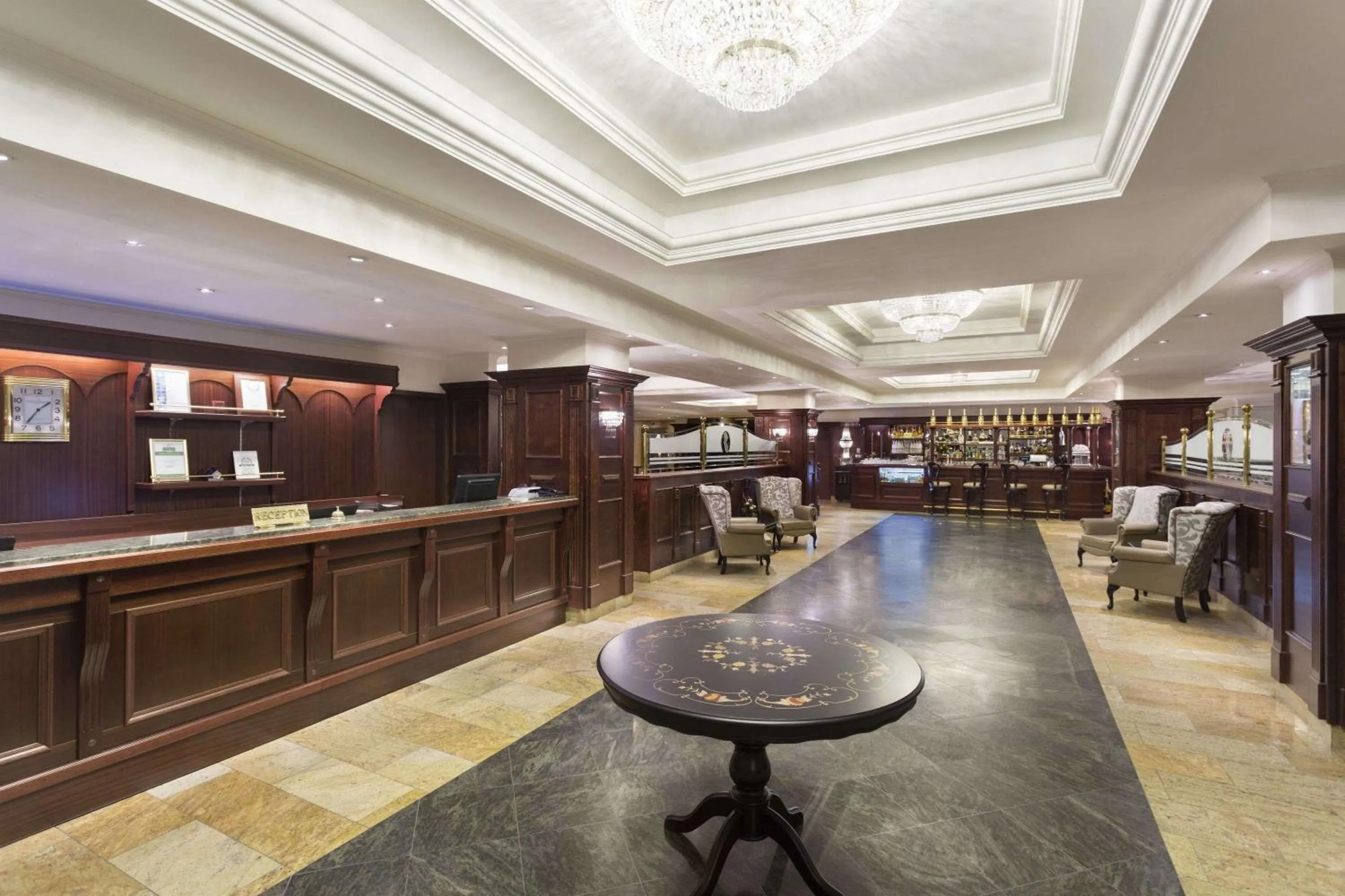 Lobby or reception in Ramada Hotel & Suites by Wyndham Bucharest North
