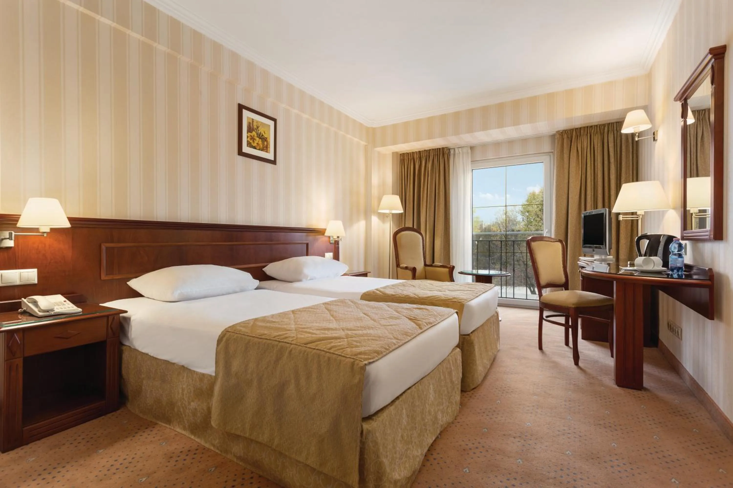 Photo of the whole room, Bed in Ramada Hotel & Suites by Wyndham Bucharest North