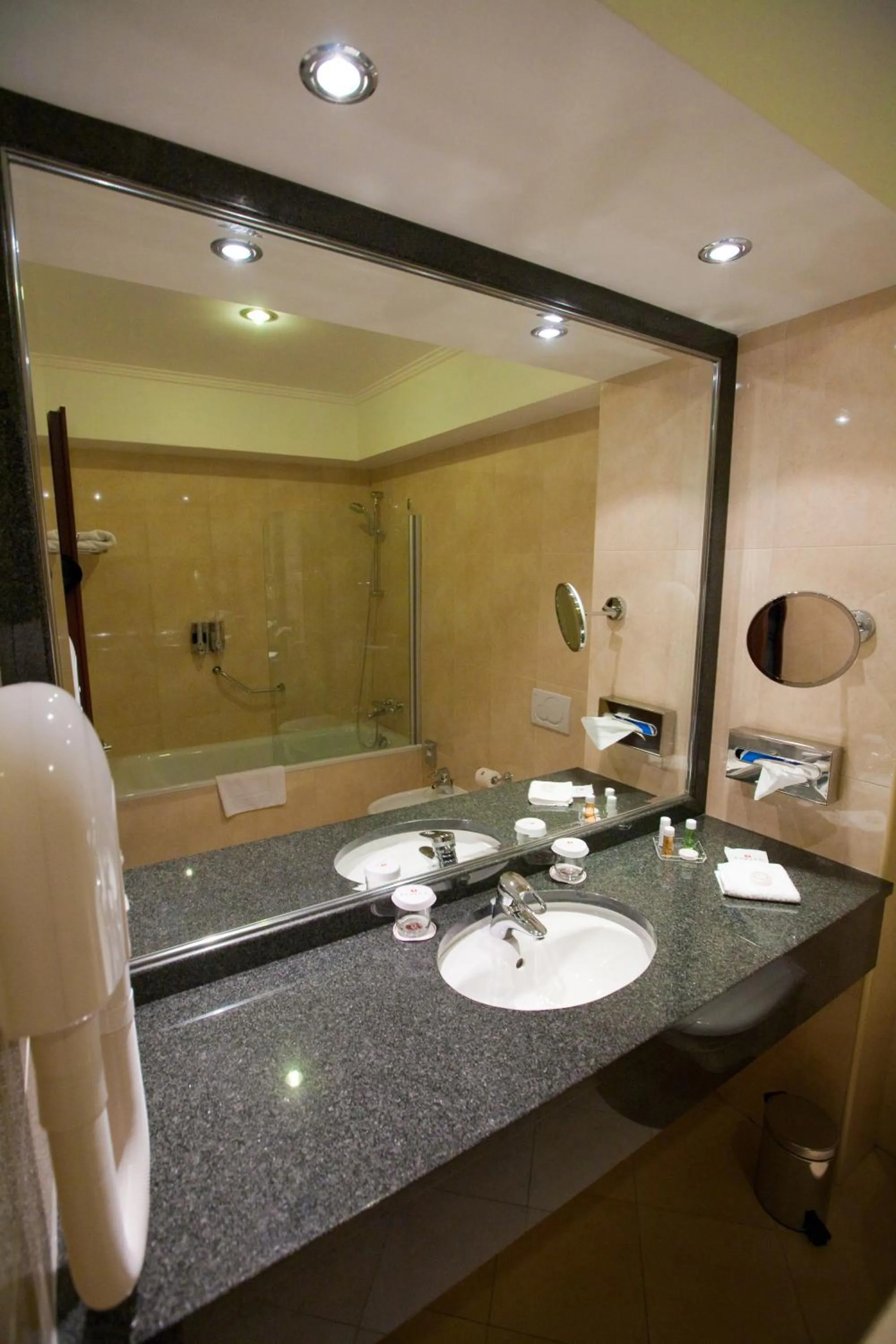 Bathroom in Ramada Hotel & Suites by Wyndham Bucharest North