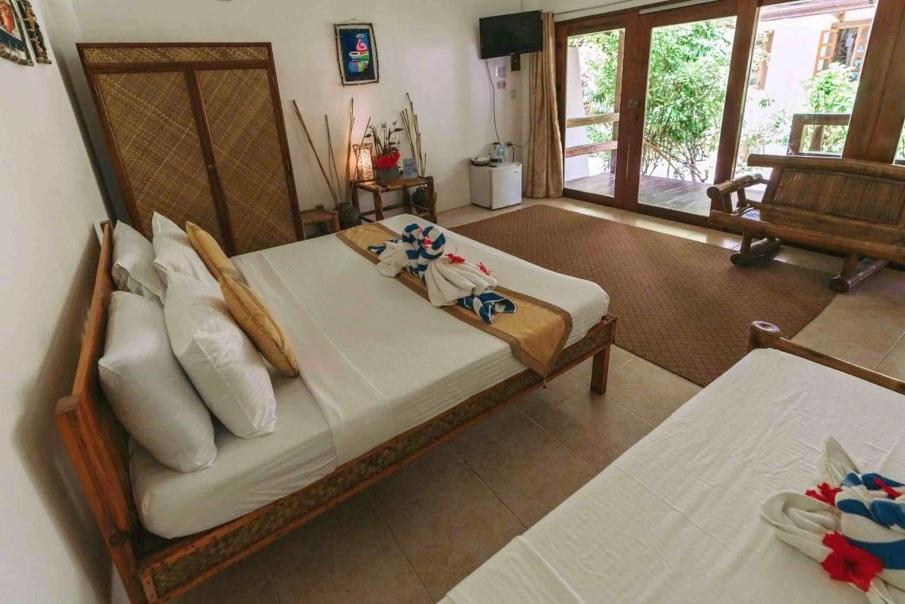 Bed in Romantic Beach Villas