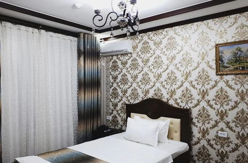 Bed in Hotel Naxshab