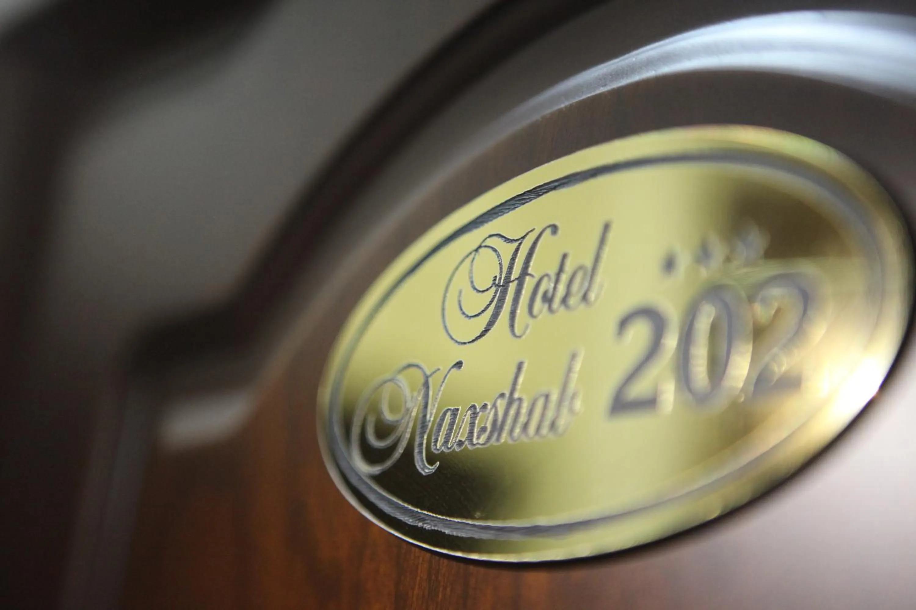 Property logo or sign in Hotel Naxshab