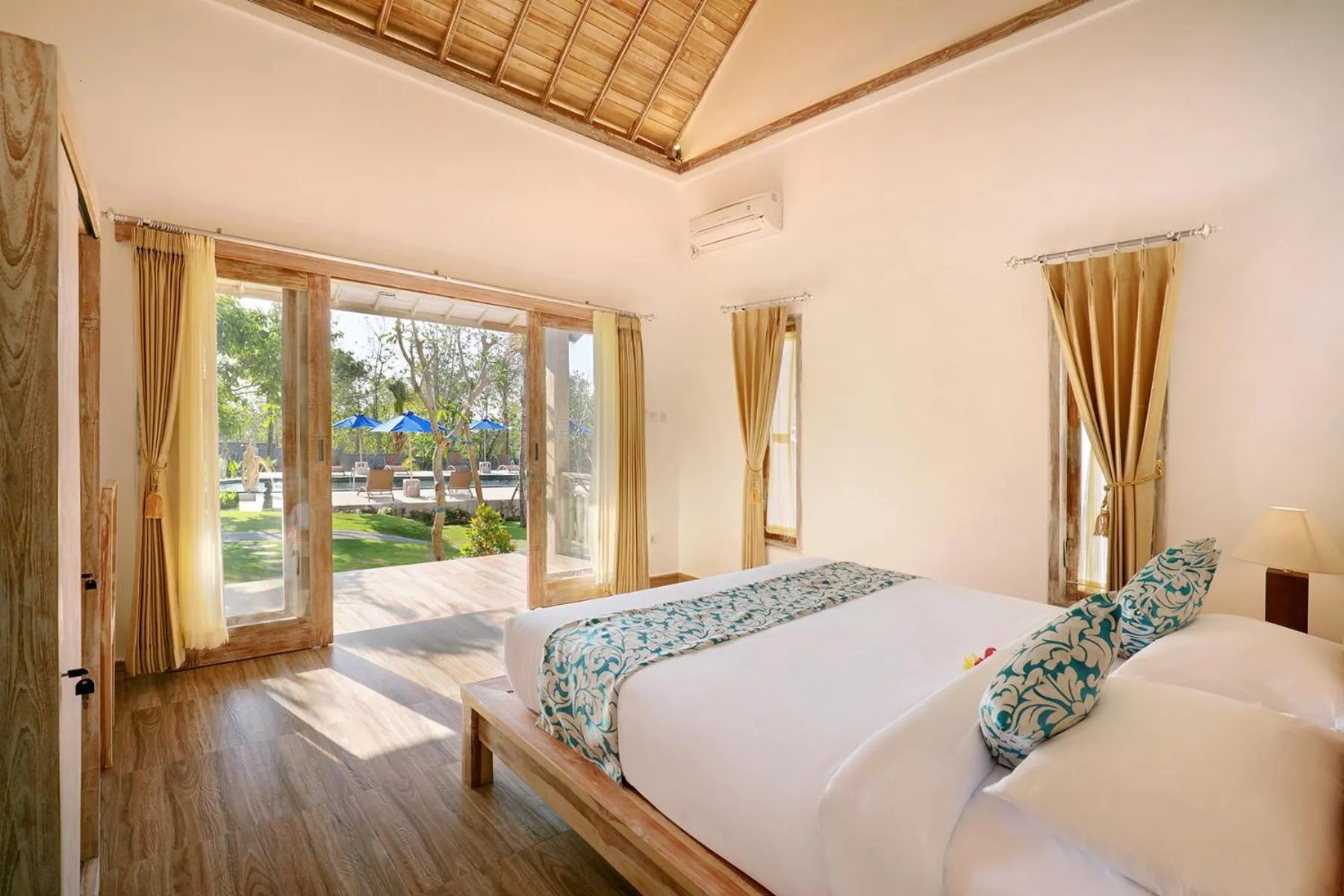 Bed in Bukal Sari Villas Uluwatu
