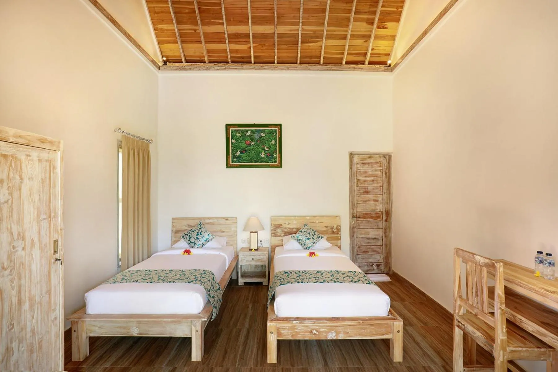 Bed in Bukal Sari Villas Uluwatu