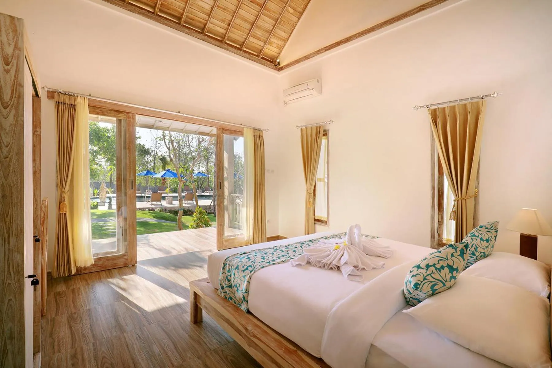 Bed in Bukal Sari Villas Uluwatu