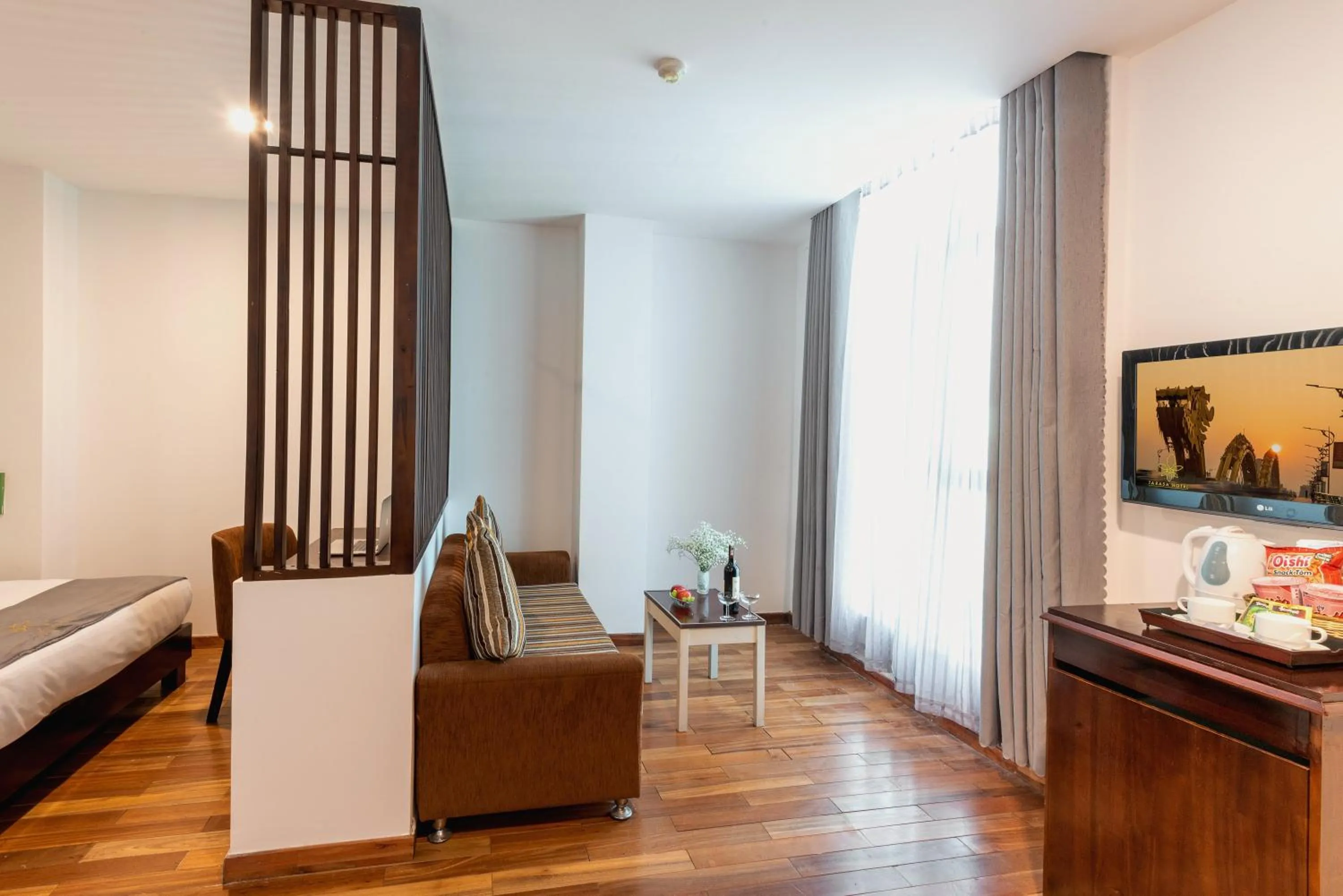 Communal lounge/ TV room, Bed in Tarasa Hotel