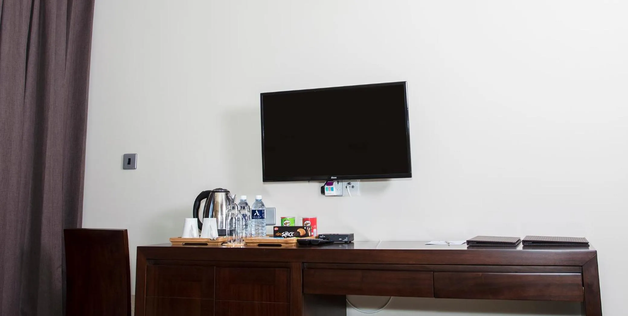 Communal lounge/ TV room in Amora Lagoon Hotel
