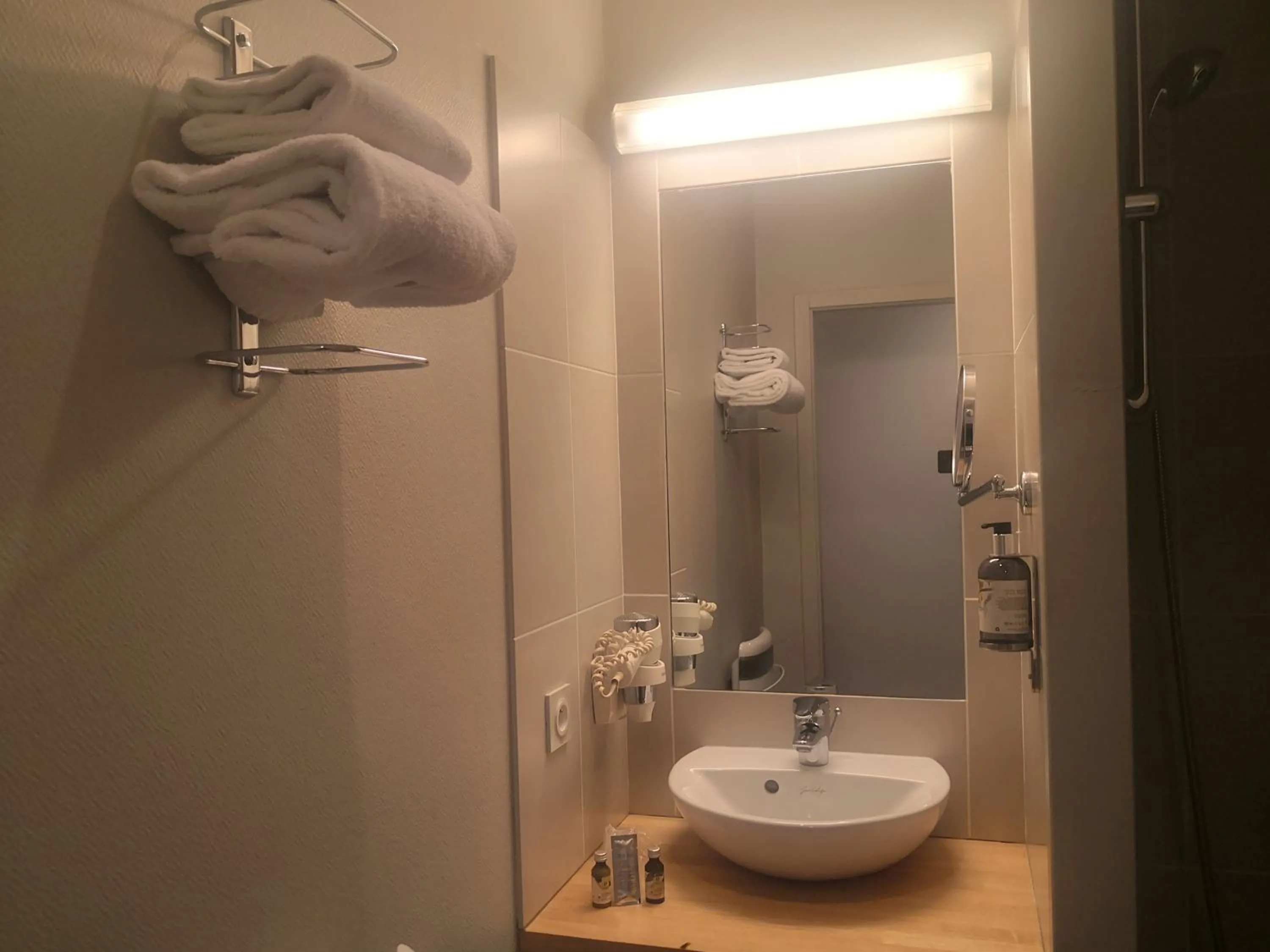 Bathroom in Logis Hotel Le Nouvel