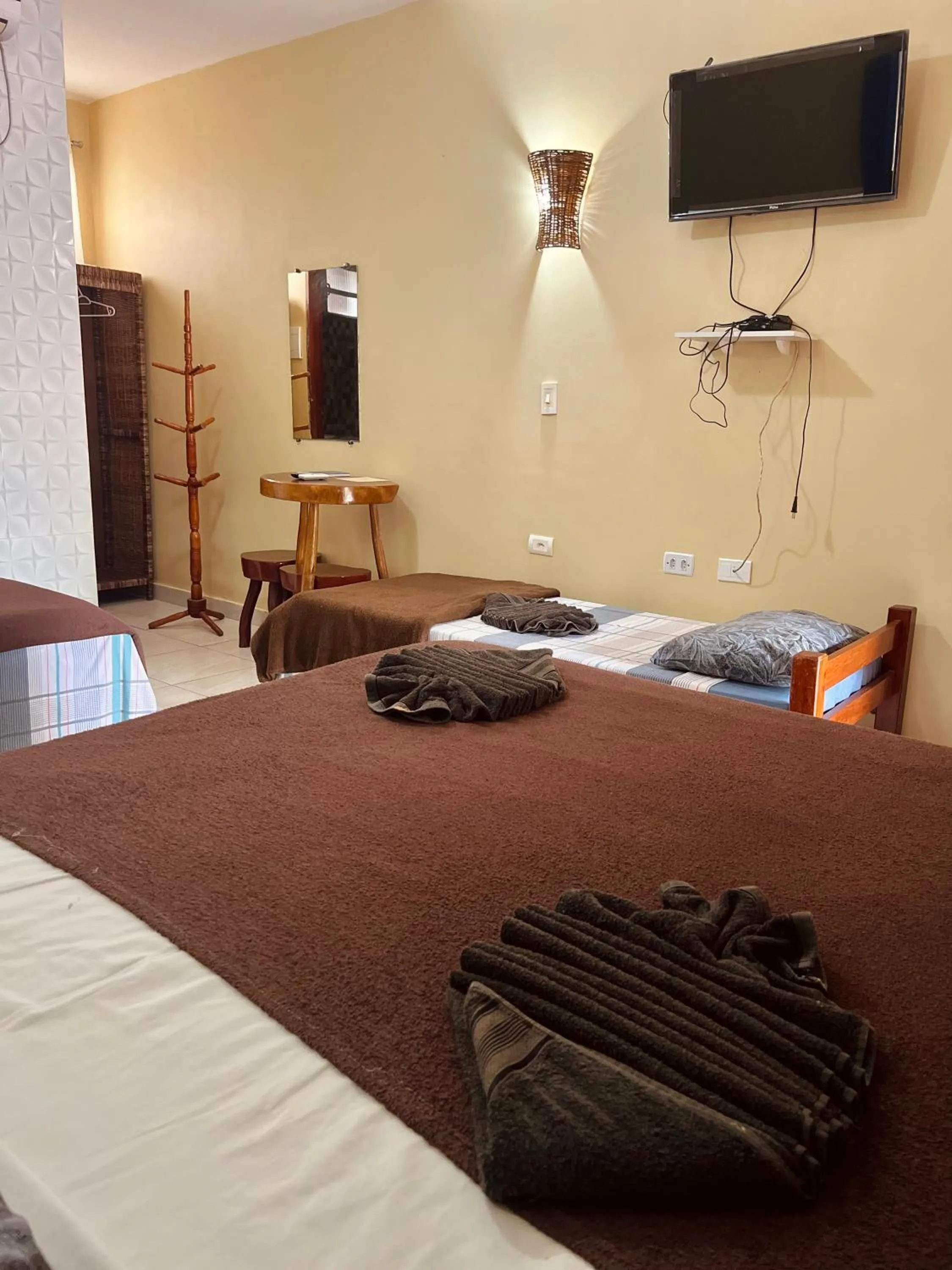 Bed in Pousada Costa Tropical