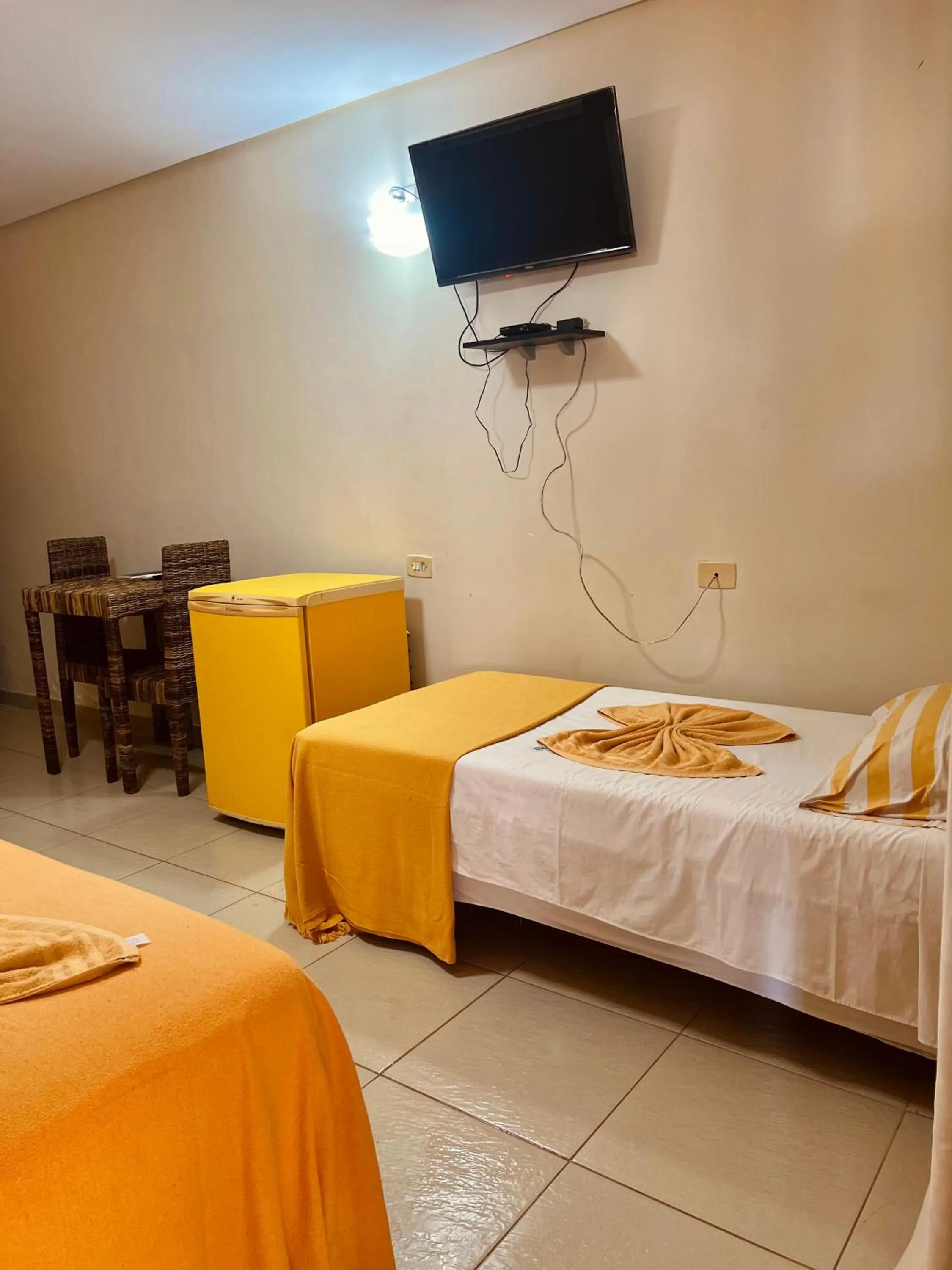 Bed in Pousada Costa Tropical