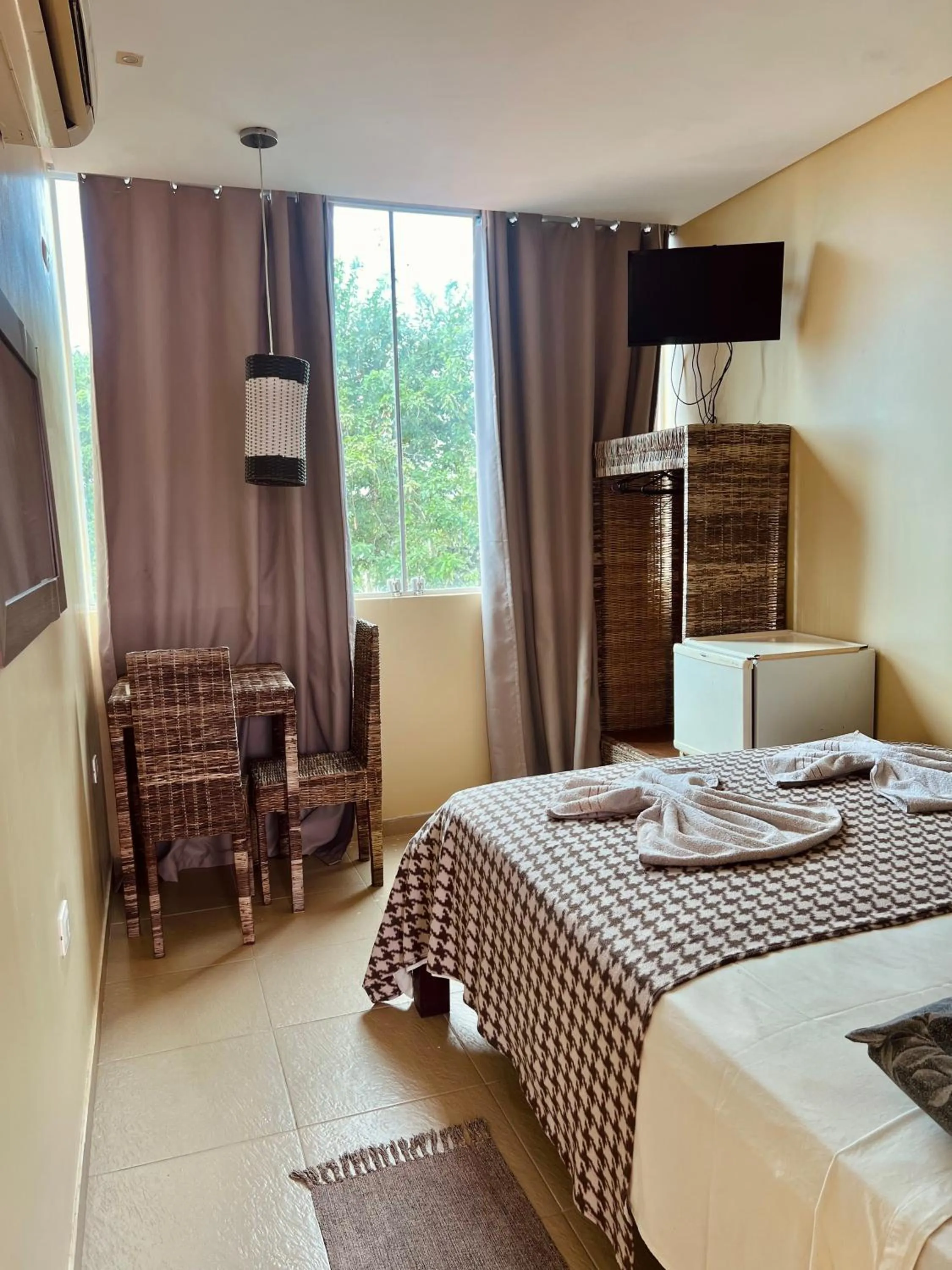 Bed in Pousada Costa Tropical