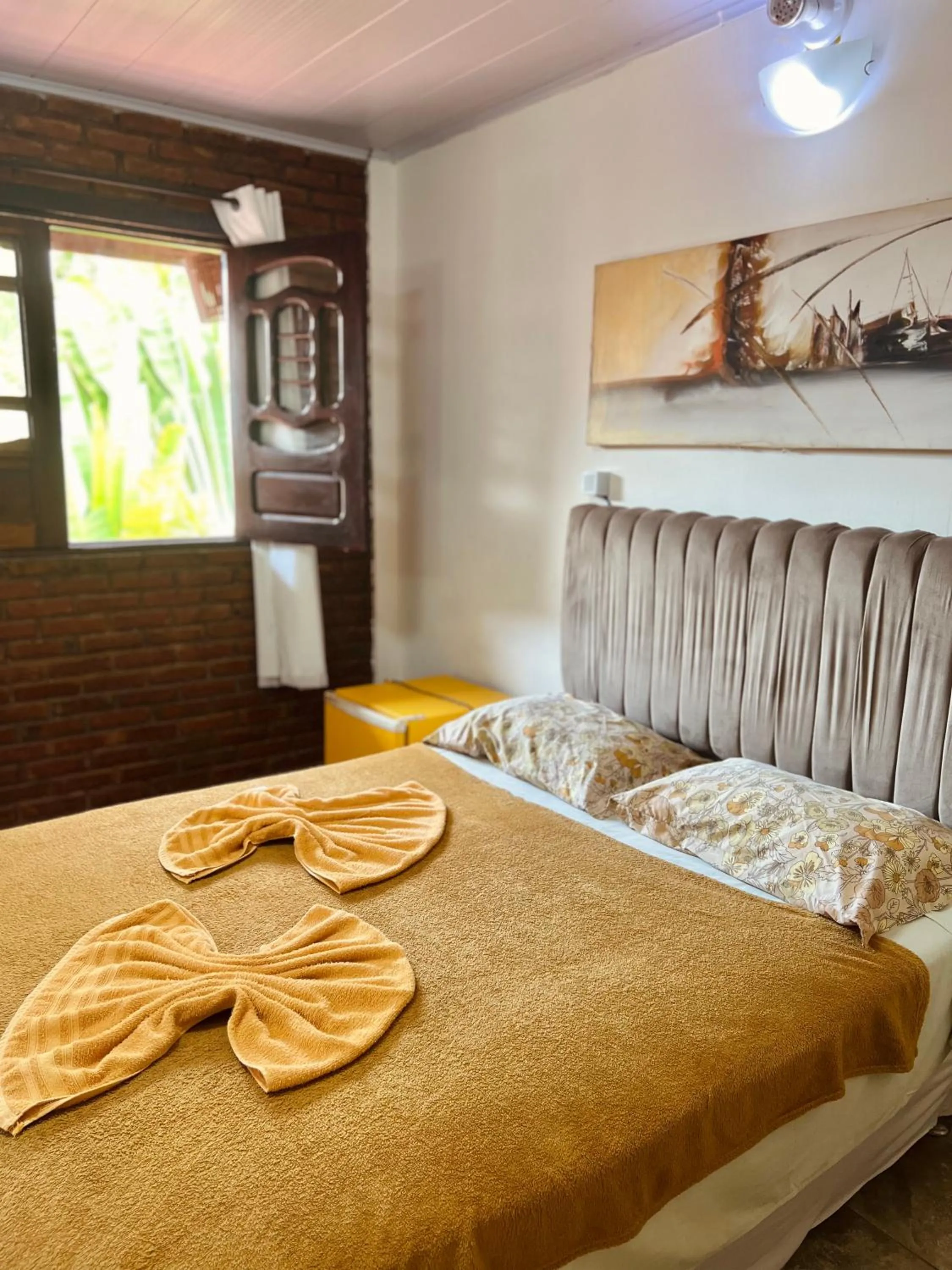 Bed in Pousada Costa Tropical