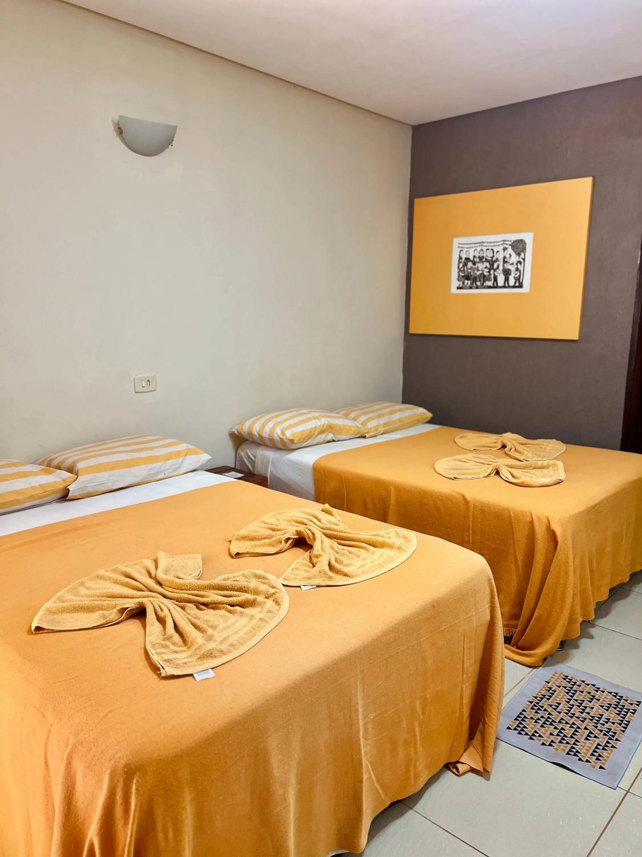 Bed in Pousada Costa Tropical