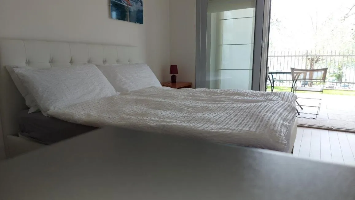 Bed in Villa Treccani Apartments