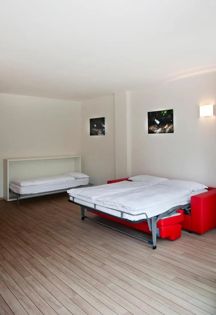 Bed in Villa Treccani Apartments