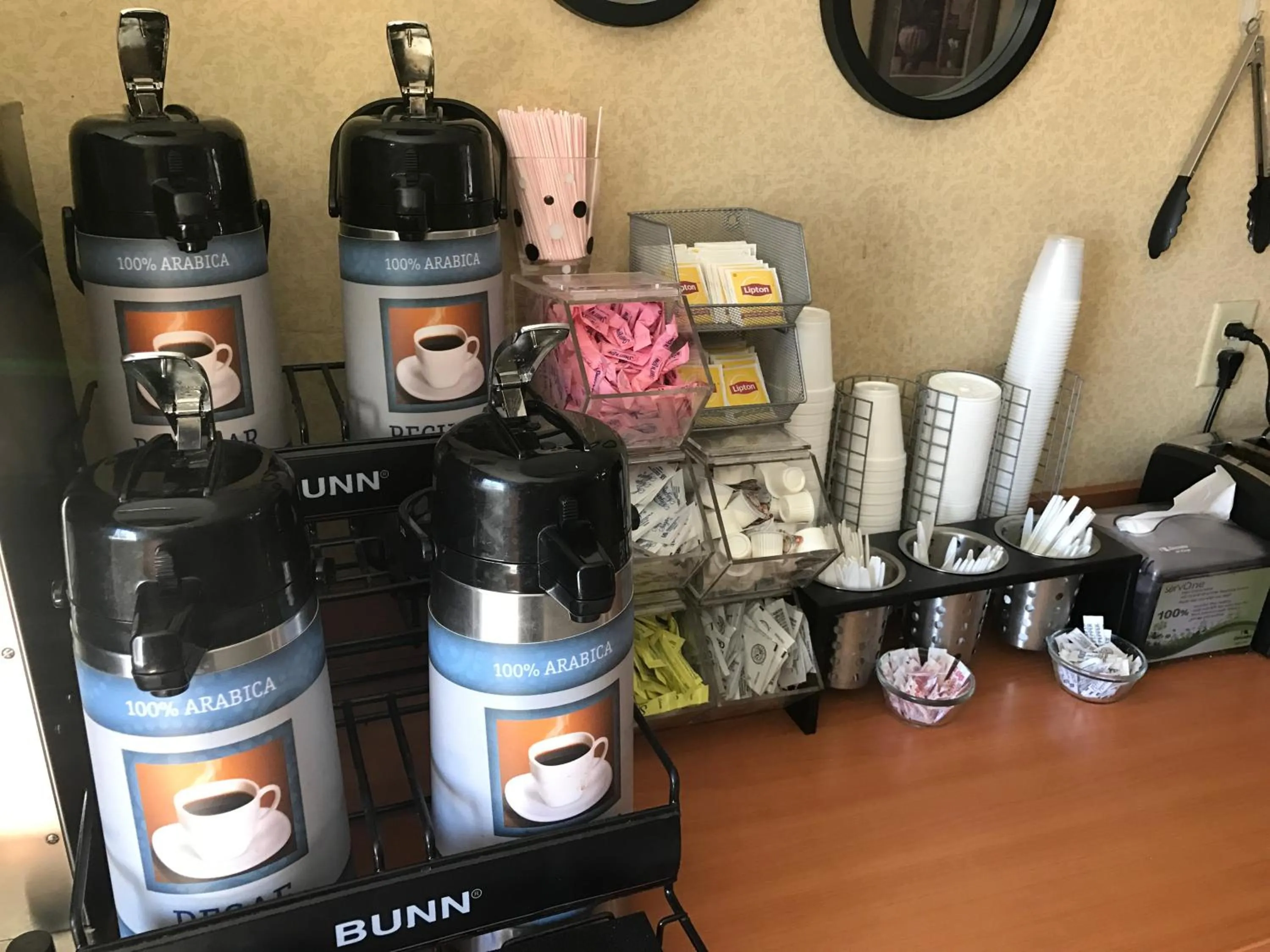 NEW 2026-Ocean Sands Beach Boutique Inn-Sauna and Salt-Mineral Pool -Free Beach Bikes and Famous Beach- Fresh Baked Cookies and Popcorn - Bathrobes and Sunscreen in all rooms-Ultra Sparkling-Free Laundry- 4 Grand Black Beds-Call NOW & Save-1-252-AHA-SAND