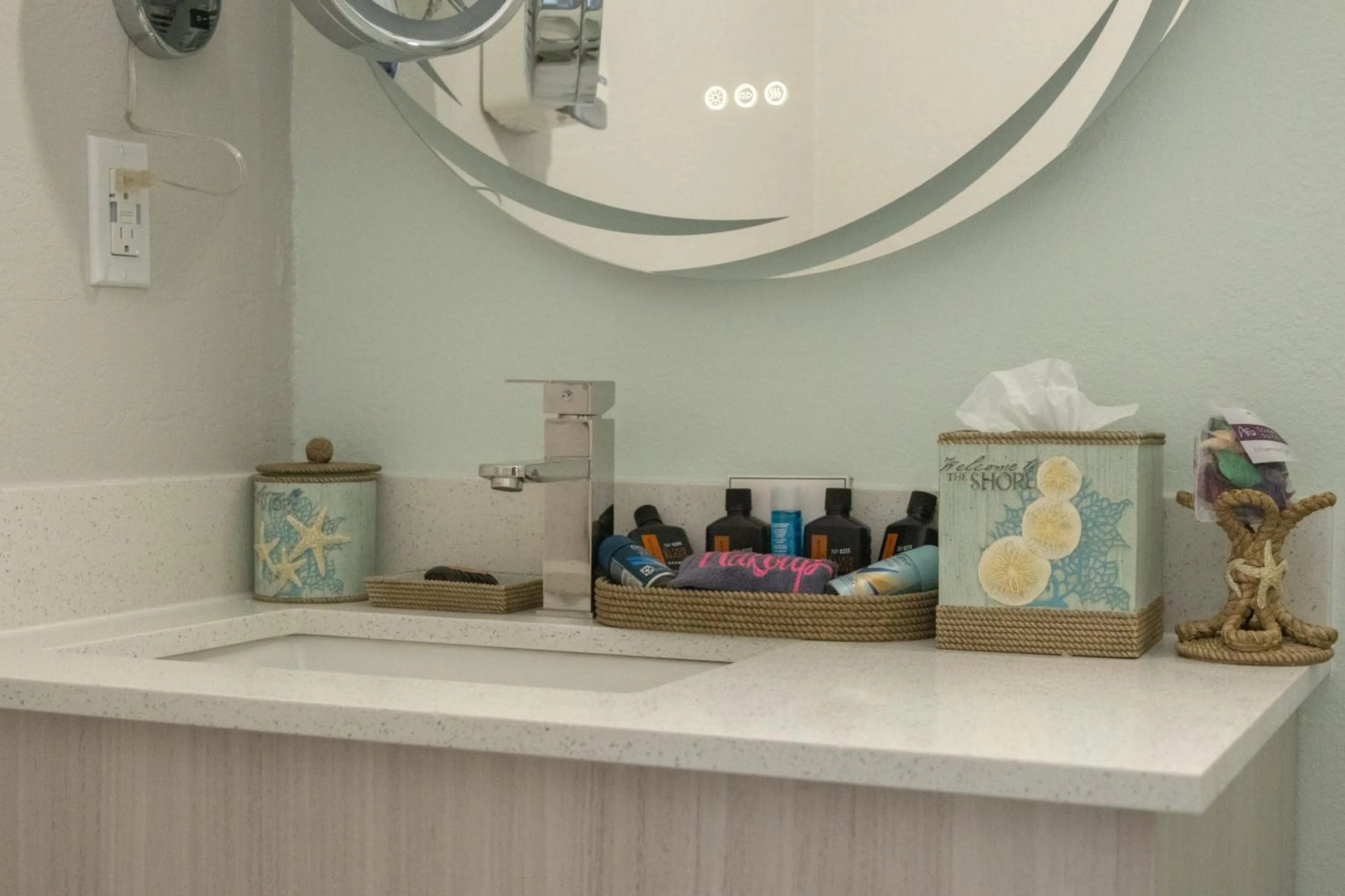 Bathroom in NEW 2026-Ocean Sands Beach Boutique Inn-Sauna and Salt-Mineral Pool -Free Beach Bikes and Famous Beach- Fresh Baked Cookies and Popcorn - Bathrobes and Sunscreen in all rooms-Ultra Sparkling-Free Laundry- 4 Grand Black Beds-Call NOW & Save-1-252-AHA-SAND