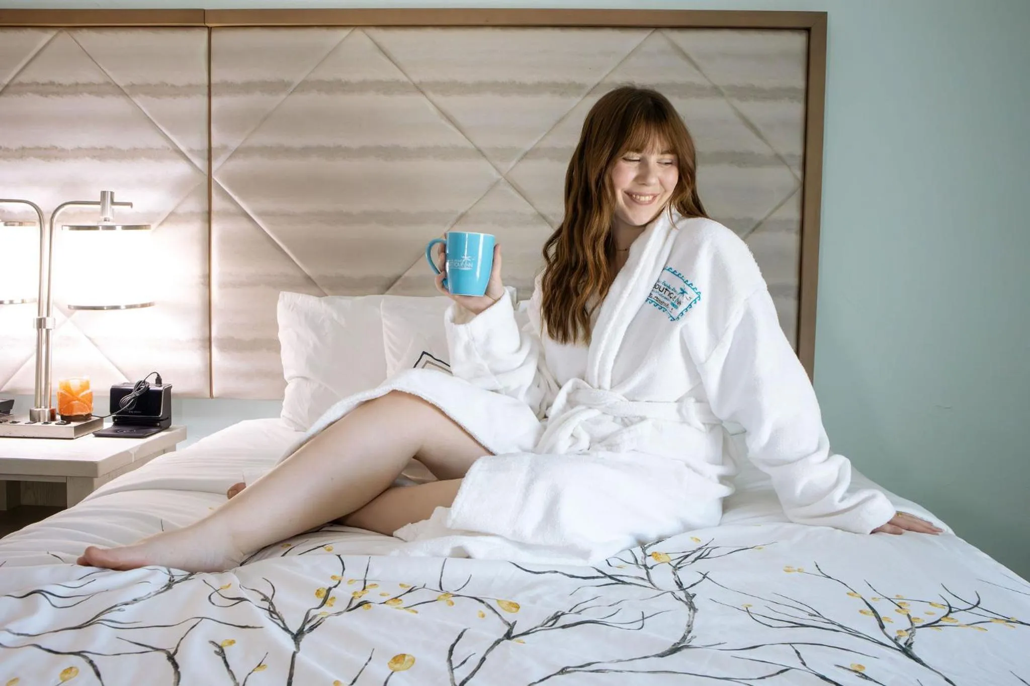 Bed in NEW 2026-Ocean Sands Beach Boutique Inn-Sauna and Salt-Mineral Pool -Free Beach Bikes and Famous Beach- Fresh Baked Cookies and Popcorn - Bathrobes and Sunscreen in all rooms-Ultra Sparkling-Free Laundry- 4 Grand Black Beds-Call NOW & Save-1-252-AHA-SAND