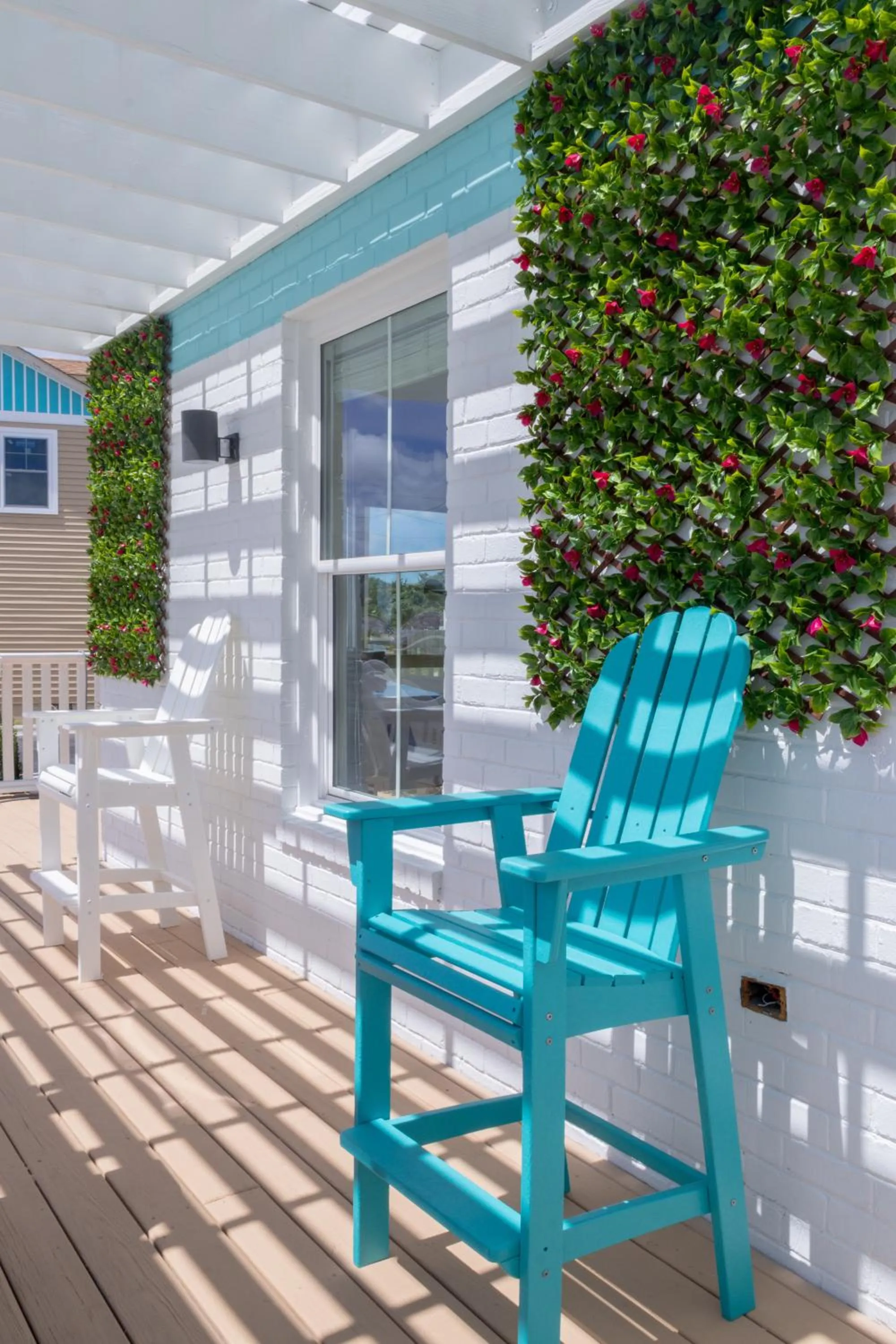 Property building in NEW 2026-Ocean Sands Beach Boutique Inn-Sauna and Salt-Mineral Pool -Free Beach Bikes and Famous Beach- Fresh Baked Cookies and Popcorn - Bathrobes and Sunscreen in all rooms-Ultra Sparkling-Free Laundry- 4 Grand Black Beds-Call NOW & Save-1-252-AHA-SAND