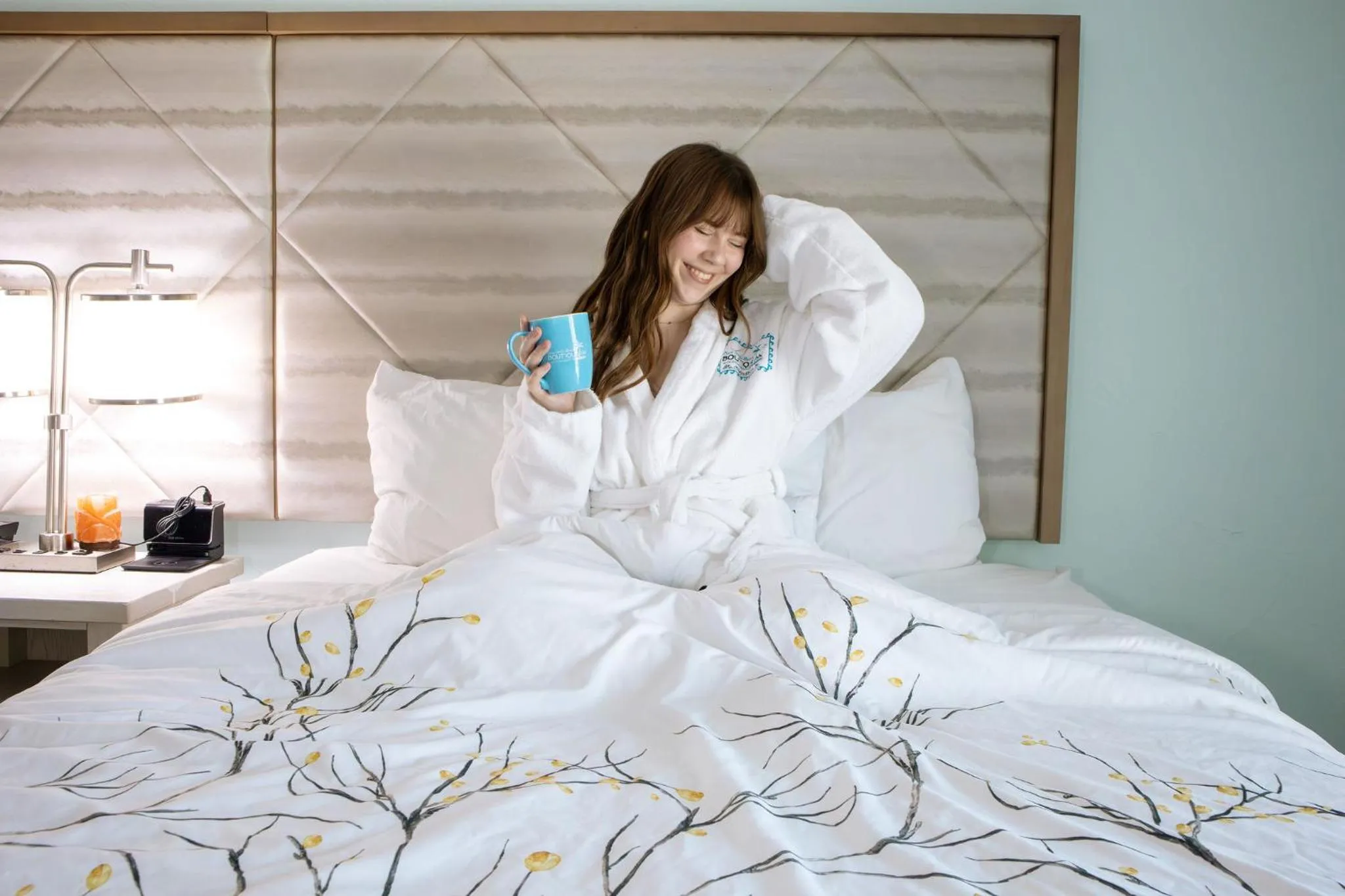 Bed in NEW 2026-Ocean Sands Beach Boutique Inn-Sauna and Salt-Mineral Pool -Free Beach Bikes and Famous Beach- Fresh Baked Cookies and Popcorn - Bathrobes and Sunscreen in all rooms-Ultra Sparkling-Free Laundry- 4 Grand Black Beds-Call NOW & Save-1-252-AHA-SAND