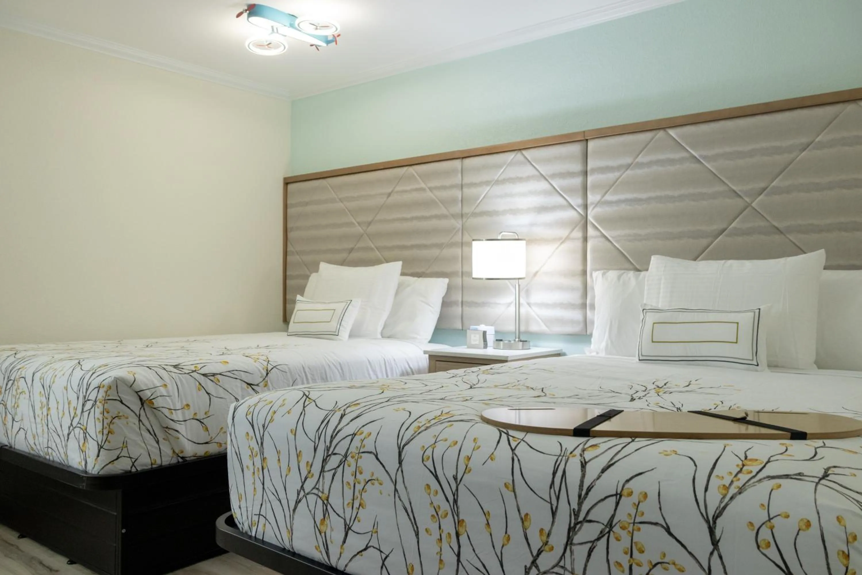 Bedroom, Bed in NEW 2026-Ocean Sands Beach Boutique Inn-Sauna and Salt-Mineral Pool -Free Beach Bikes and Famous Beach- Fresh Baked Cookies and Popcorn - Bathrobes and Sunscreen in all rooms-Ultra Sparkling-Free Laundry- 4 Grand Black Beds-Call NOW & Save-1-252-AHA-SAND