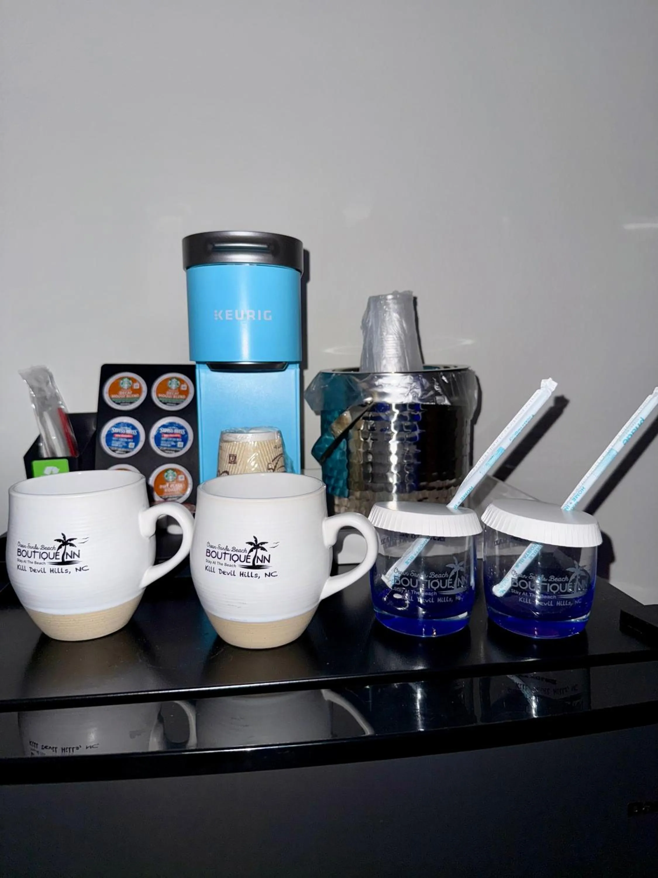 NEW 2026-Ocean Sands Beach Boutique Inn-Sauna and Salt-Mineral Pool -Free Beach Bikes and Famous Beach- Fresh Baked Cookies and Popcorn - Bathrobes and Sunscreen in all rooms-Ultra Sparkling-Free Laundry- 4 Grand Black Beds-Call NOW & Save-1-252-AHA-SAND