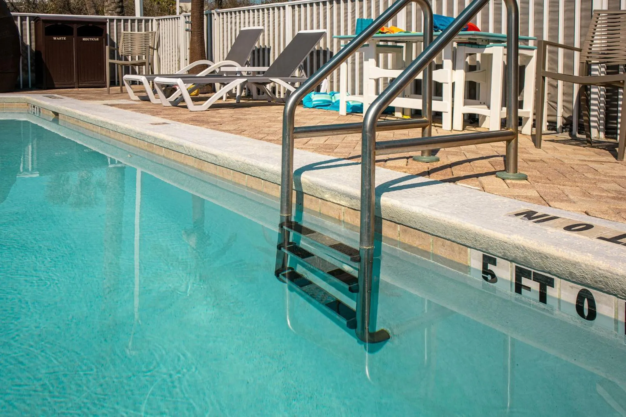 Swimming pool in NEW 2026-Ocean Sands Beach Boutique Inn-Sauna and Salt-Mineral Pool -Free Beach Bikes and Famous Beach- Fresh Baked Cookies and Popcorn - Bathrobes and Sunscreen in all rooms-Ultra Sparkling-Free Laundry- 4 Grand Black Beds-Call NOW & Save-1-252-AHA-SAND