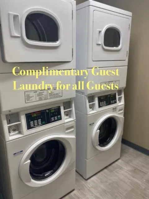 NEW 2026-Ocean Sands Beach Boutique Inn-Sauna and Salt-Mineral Pool -Free Beach Bikes and Famous Beach- Fresh Baked Cookies and Popcorn - Bathrobes and Sunscreen in all rooms-Ultra Sparkling-Free Laundry- 4 Grand Black Beds-Call NOW & Save-1-252-AHA-SAND