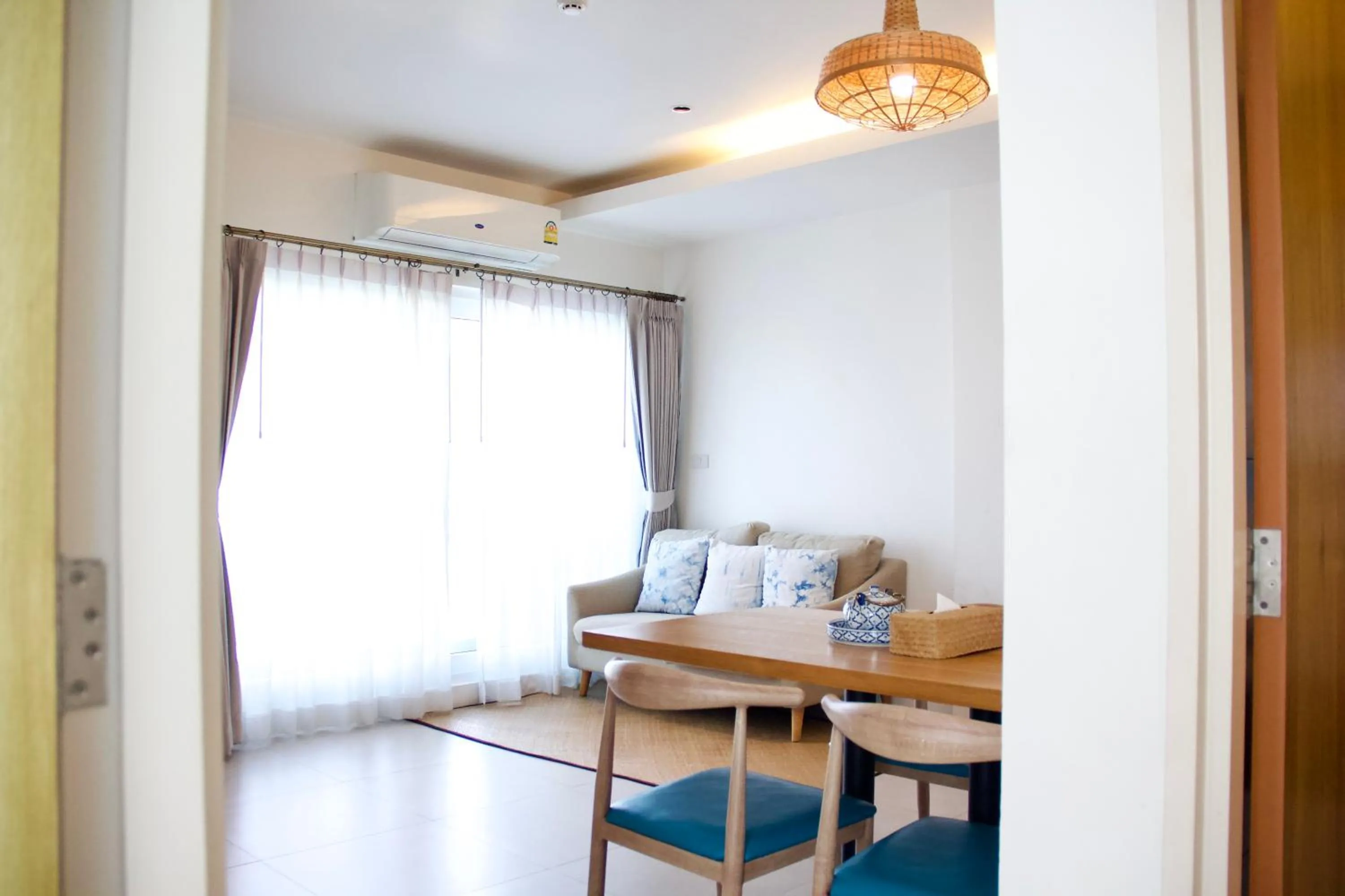 Living room in DeeProm Pattaya Hotel