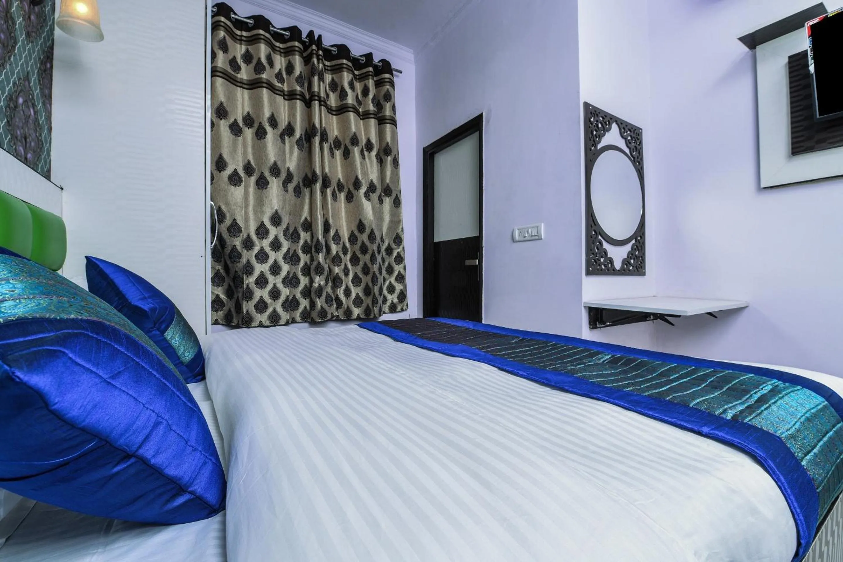 Bedroom in Hotel O Akash Continental