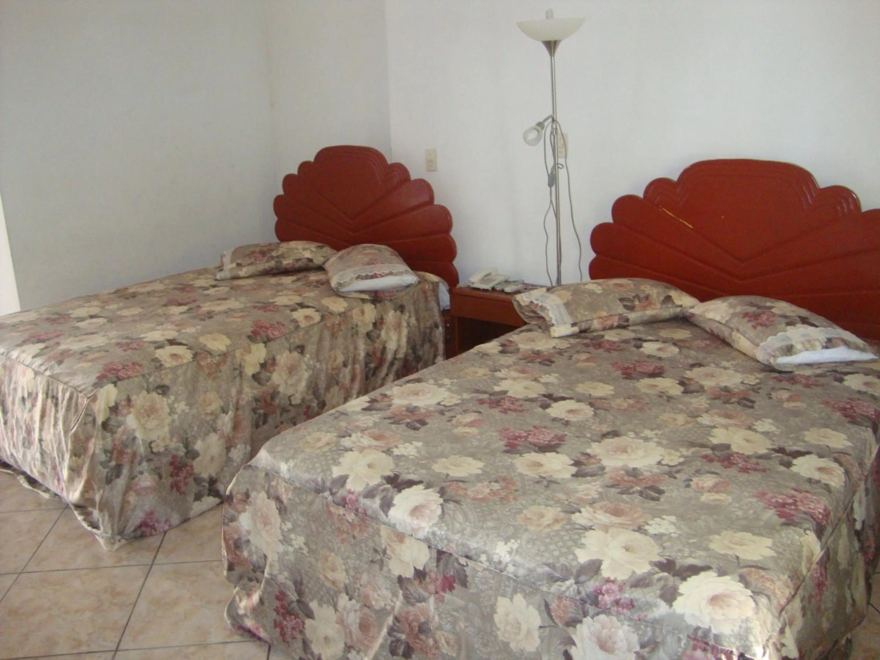 Photo of the whole room, Bed in Hotel Sol del Oriente Iquitos