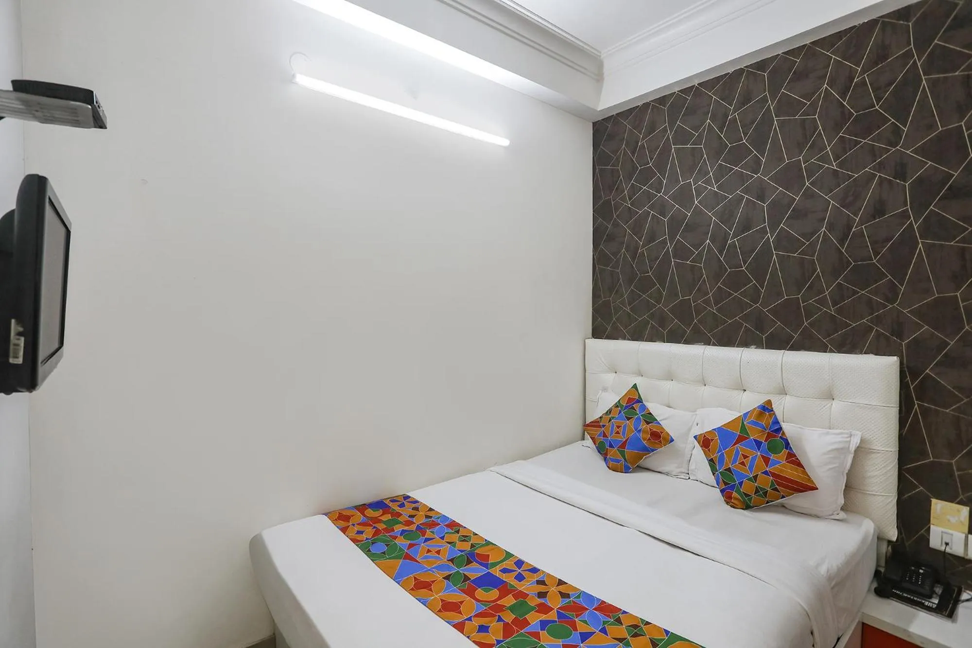 Bed in FabHotel Greenstar Inn - Bhubaneswar Airport