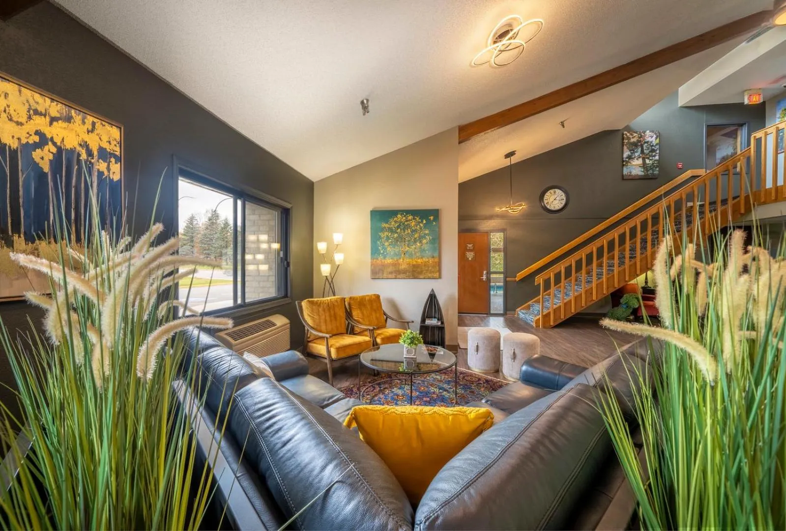 Seating area in AmericInn by Wyndham Grand Rapids